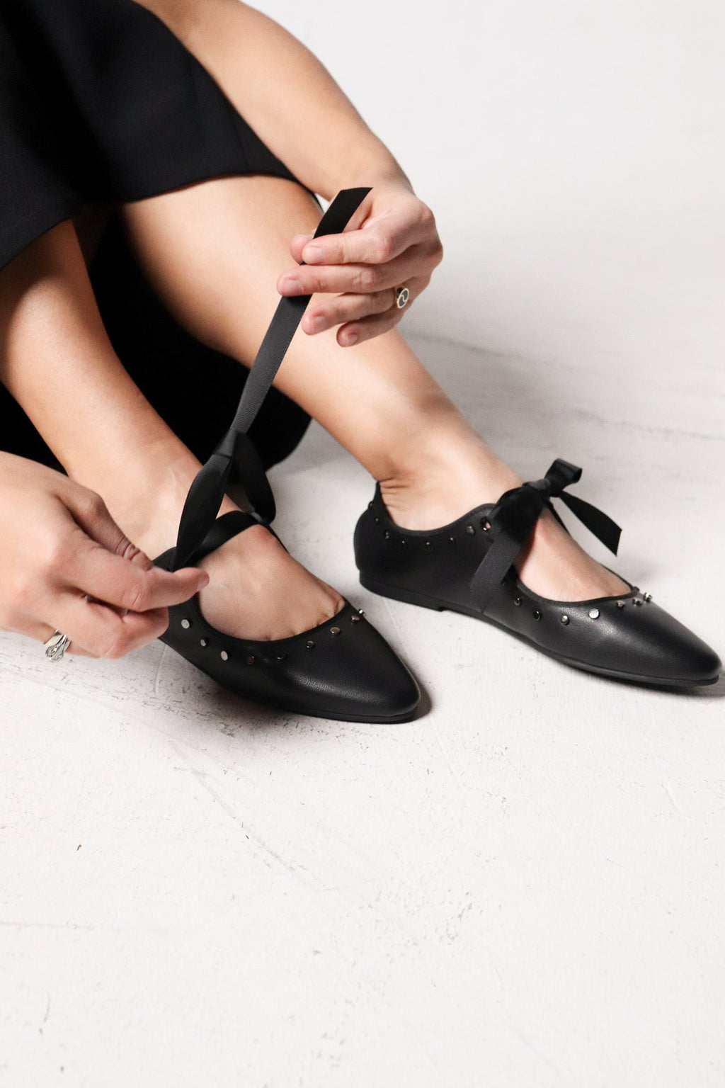 INTENTIONALLY __________. Peak Leather Ballet Flat