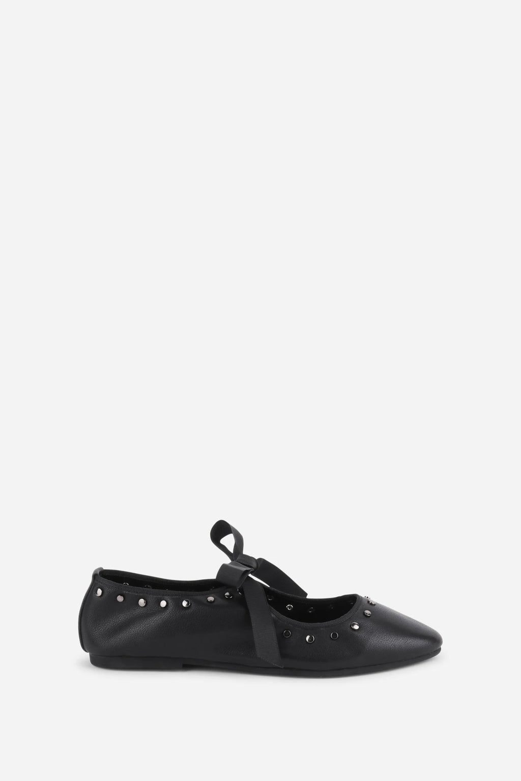 INTENTIONALLY __________. Peak Leather Ballet Flat