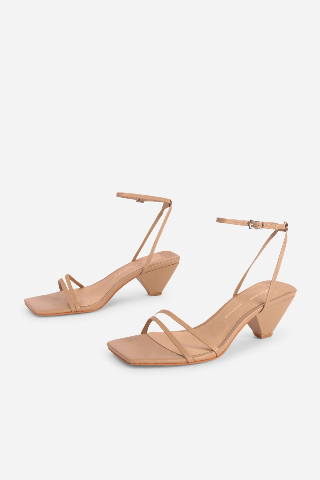 INTENTIONALLY __________. Pretty Please Leather Heel