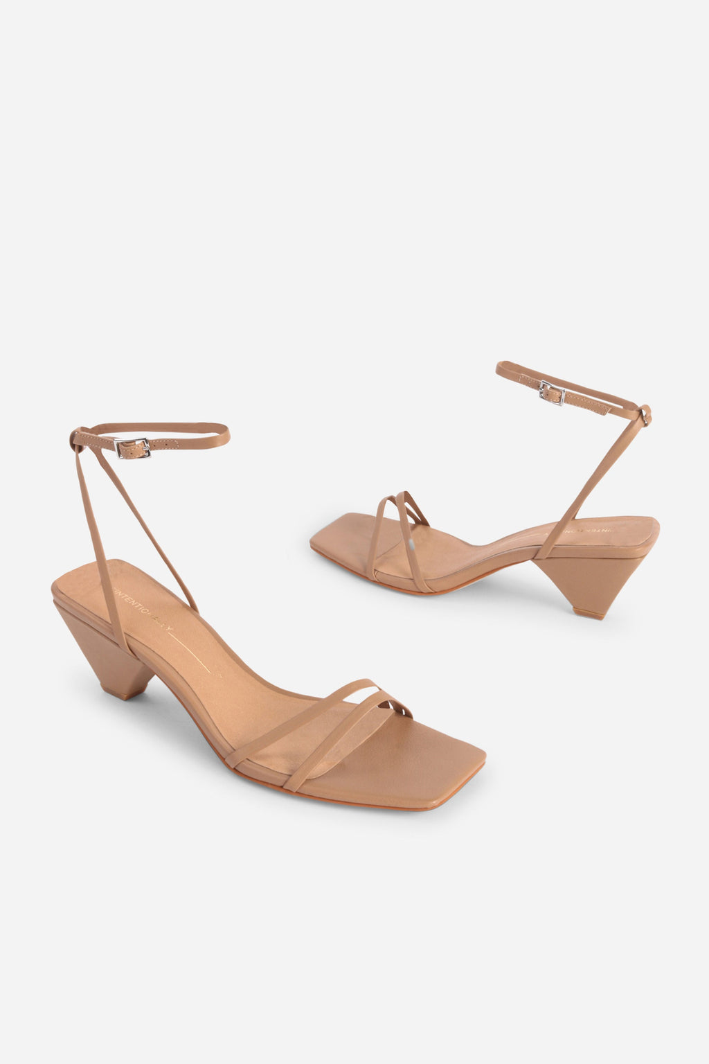 INTENTIONALLY __________. Pretty Please Leather Heel