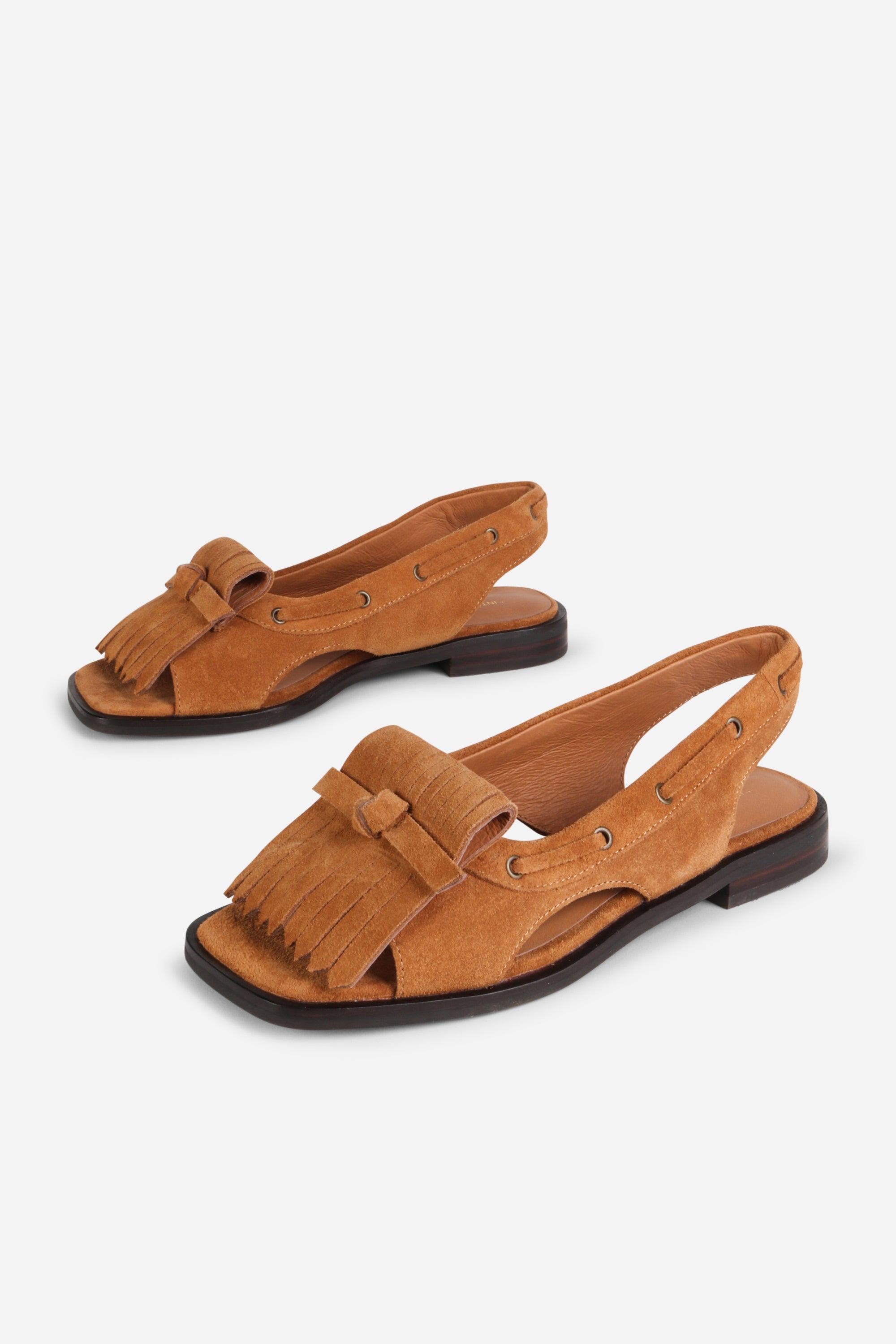 INTENTIONALLY __________. Professor Flat Fringe Sandal - Tawny