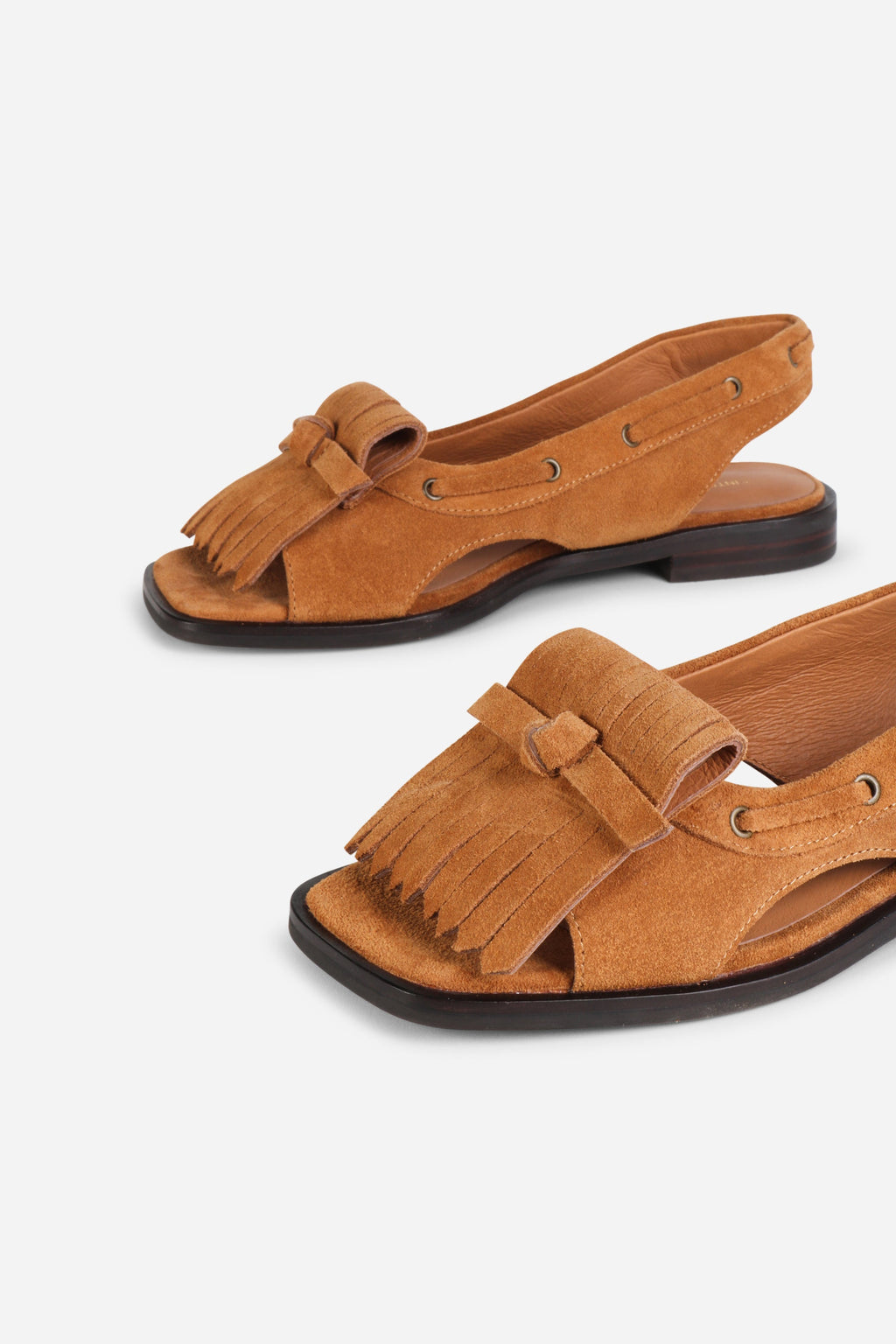 INTENTIONALLY __________. Professor Flat Fringe Sandal - Tawny
