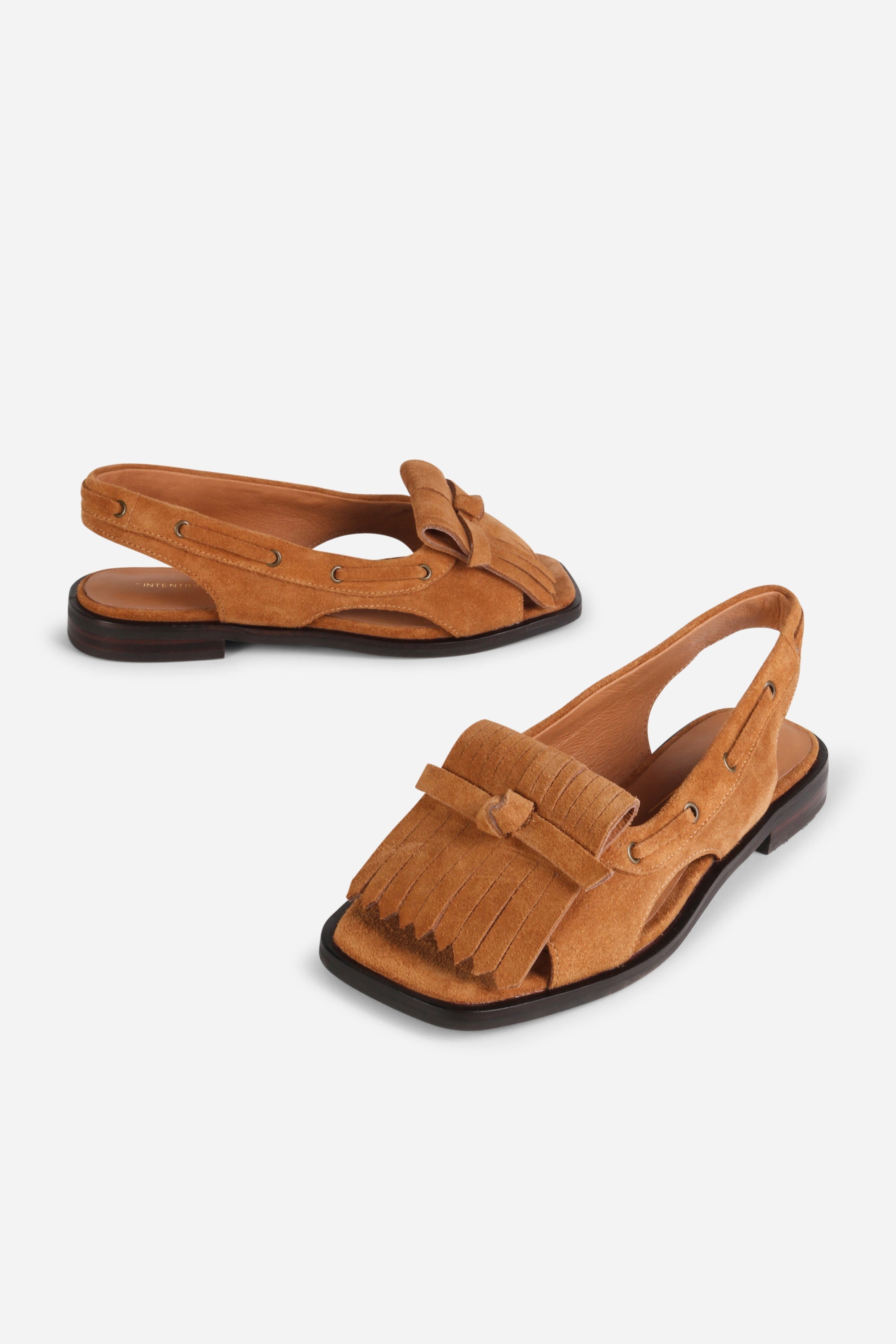 INTENTIONALLY __________. Professor Flat Fringe Sandal - Tawny