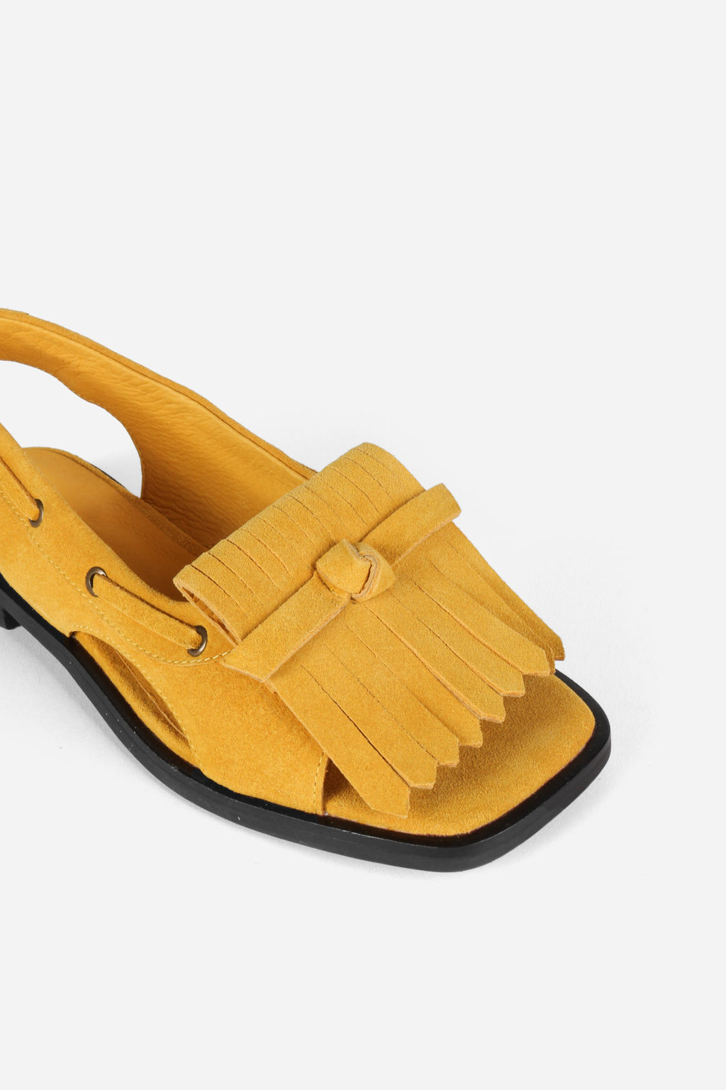 INTENTIONALLY __________. Professor Flat Fringe Sandal - Tawny