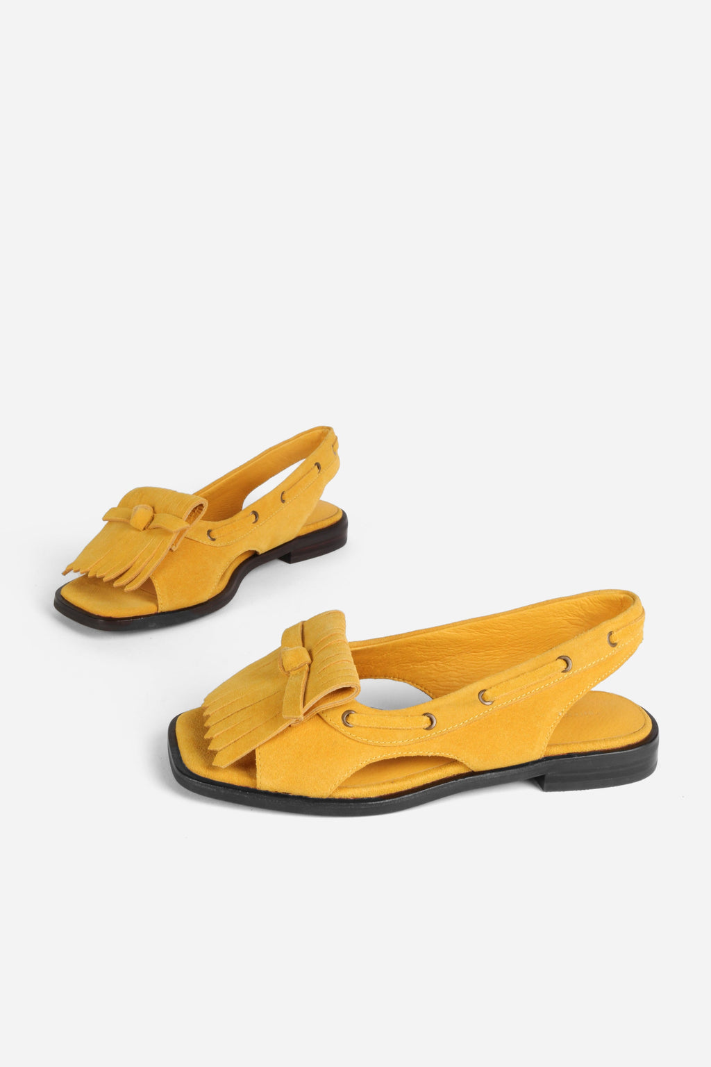 INTENTIONALLY __________. Professor Flat Fringe Sandal - Tawny
