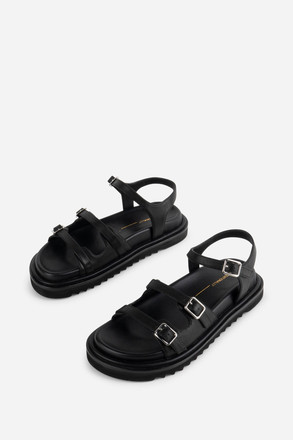 INTENTIONALLY __________. Ricoya Leather Sandal