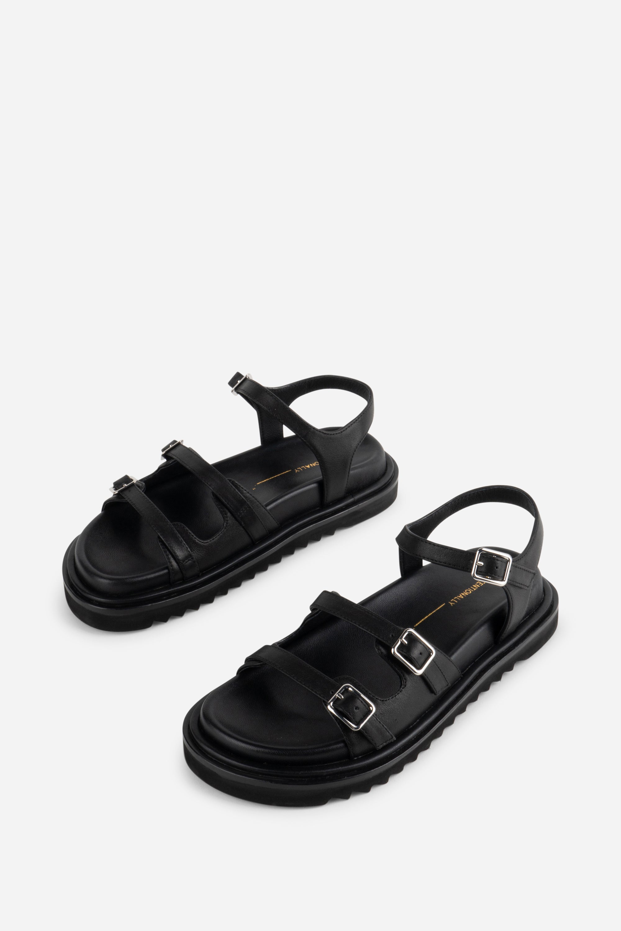 INTENTIONALLY __________. Ricoya Leather Sandal