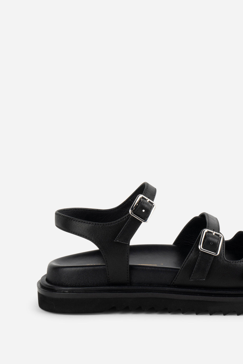 INTENTIONALLY __________. Ricoya Leather Sandal