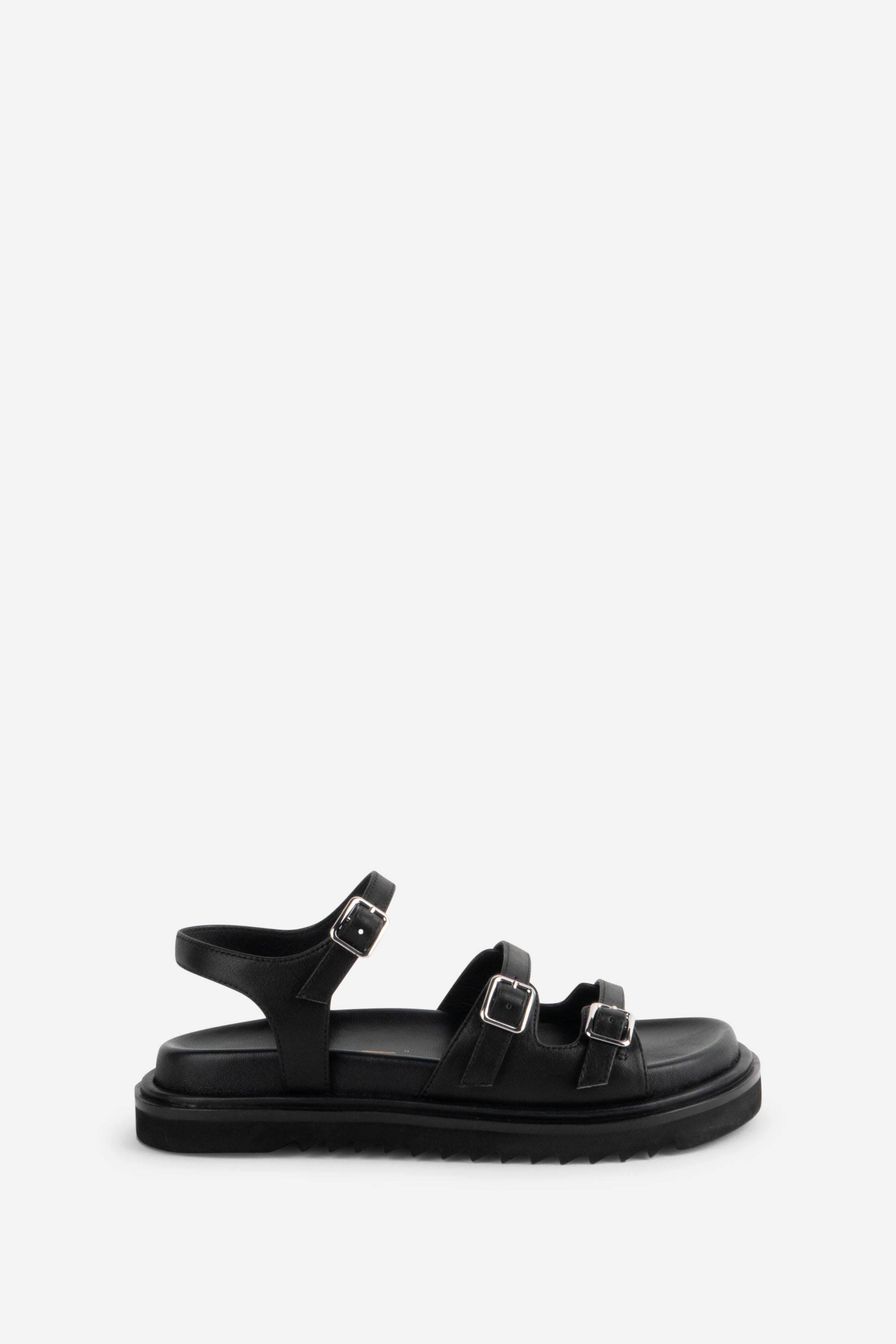 INTENTIONALLY __________. Ricoya Leather Sandal