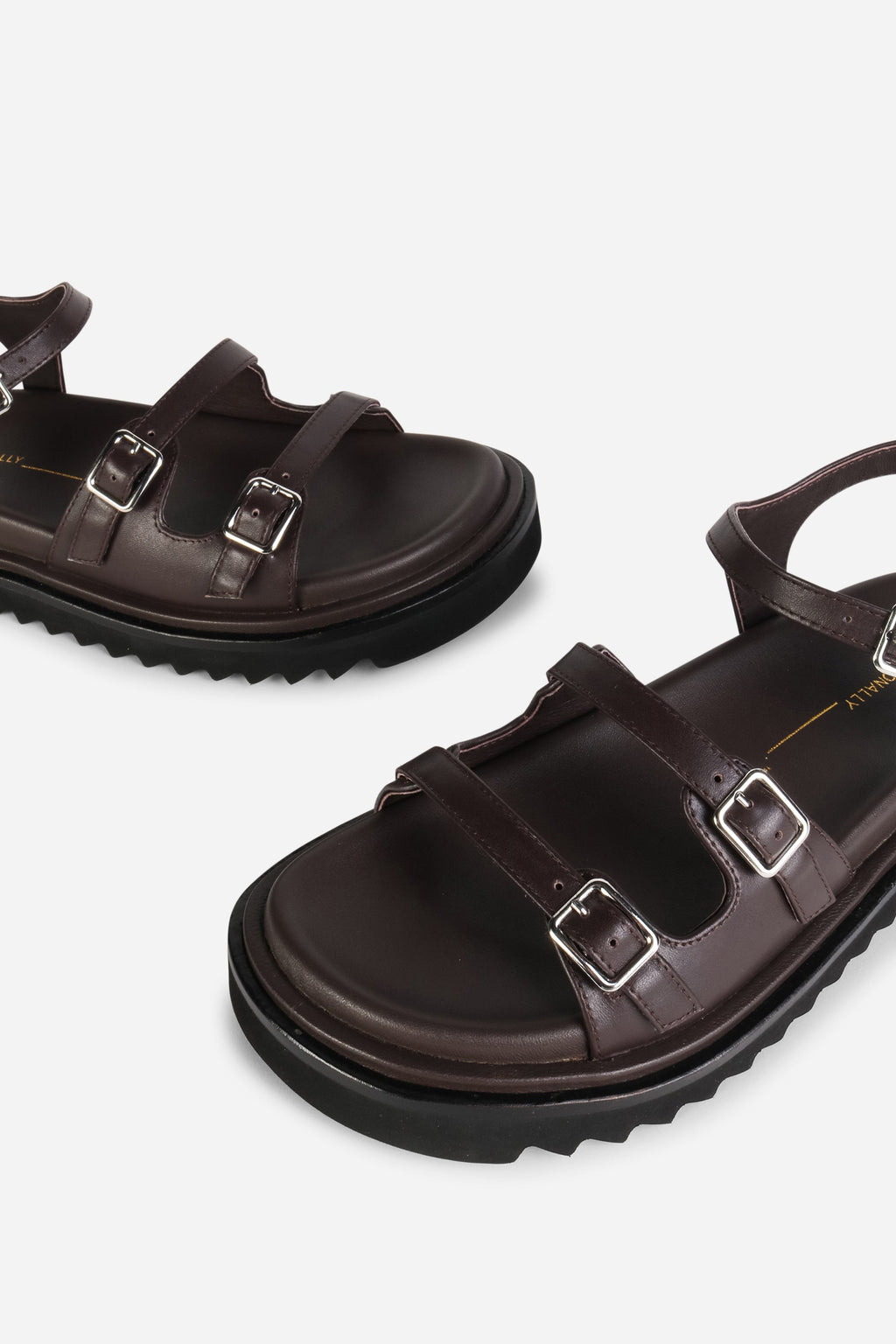 INTENTIONALLY __________. Ricoya Leather Sandal