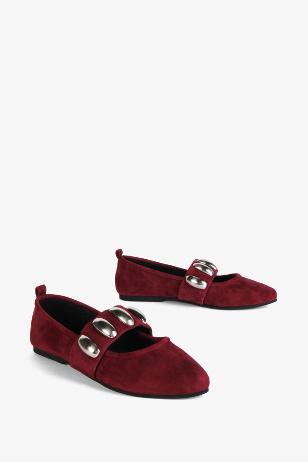 INTENTIONALLY __________. Tone Oversized Stud Mary Jane Flat