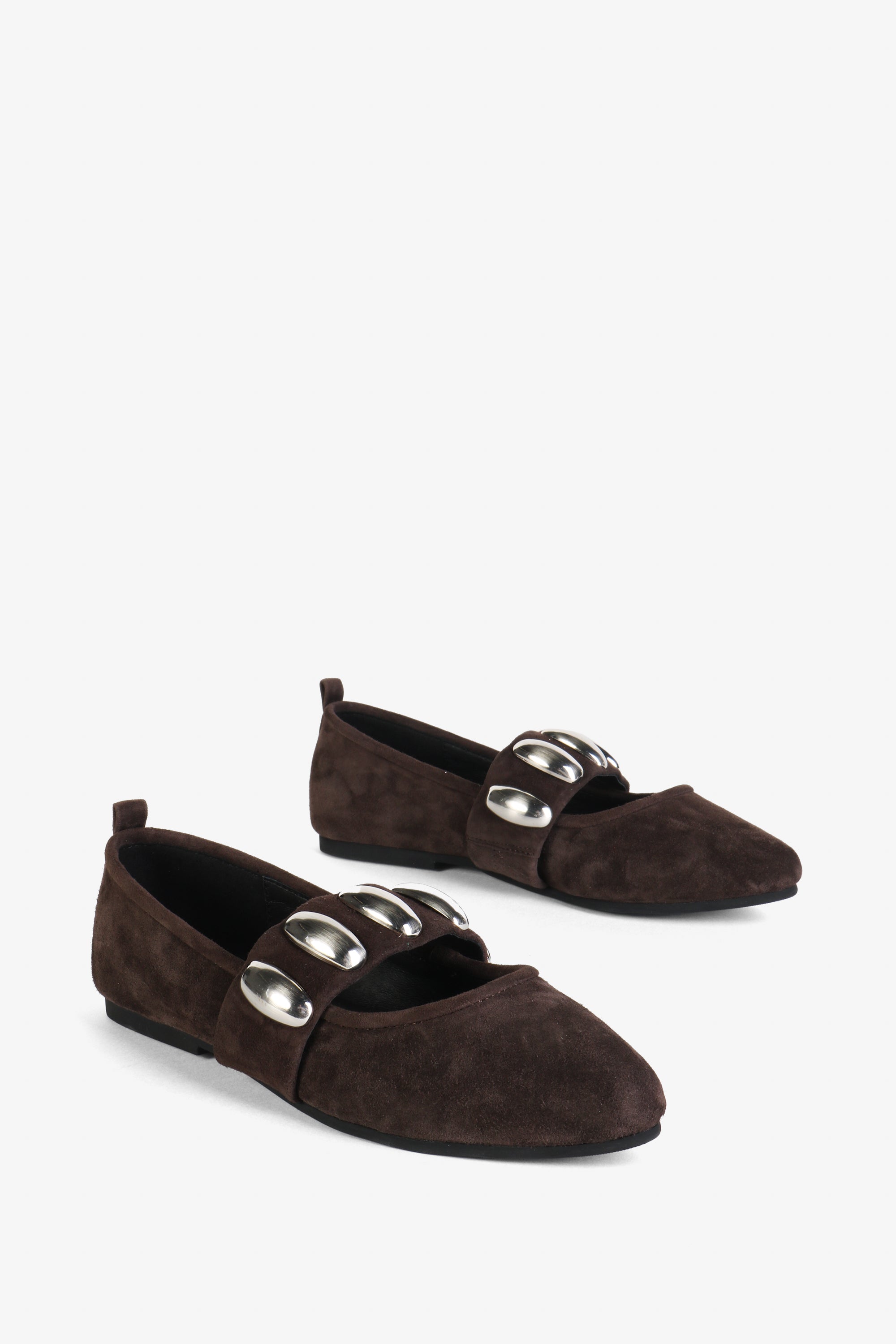 INTENTIONALLY __________. Tone Oversized Stud Mary Jane Flat