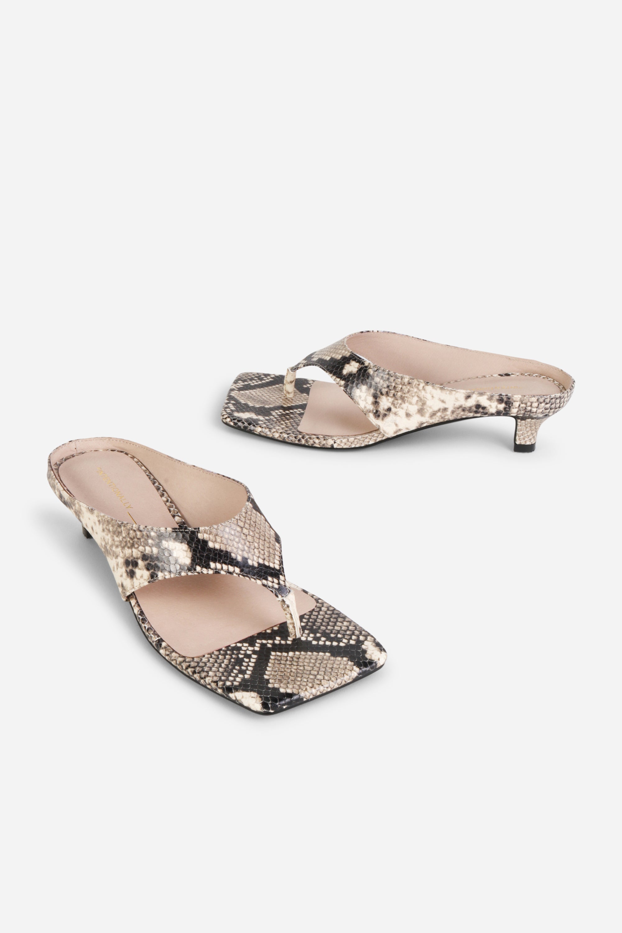 INTENTIONALLY __________. Year Ahead Snake Embossed Kitten Heel Sandals - Black White