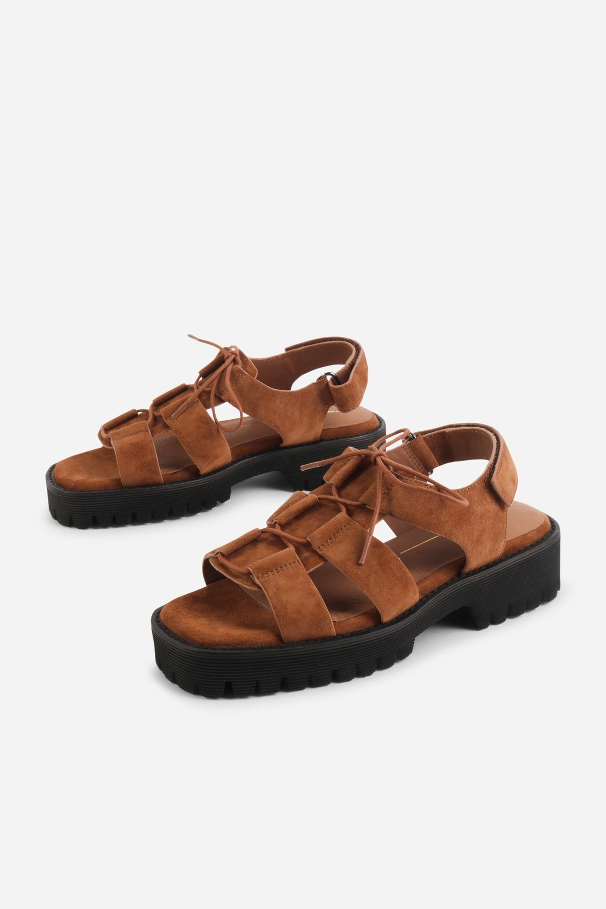 INTENTIONALLY __________. Hampton Sandals