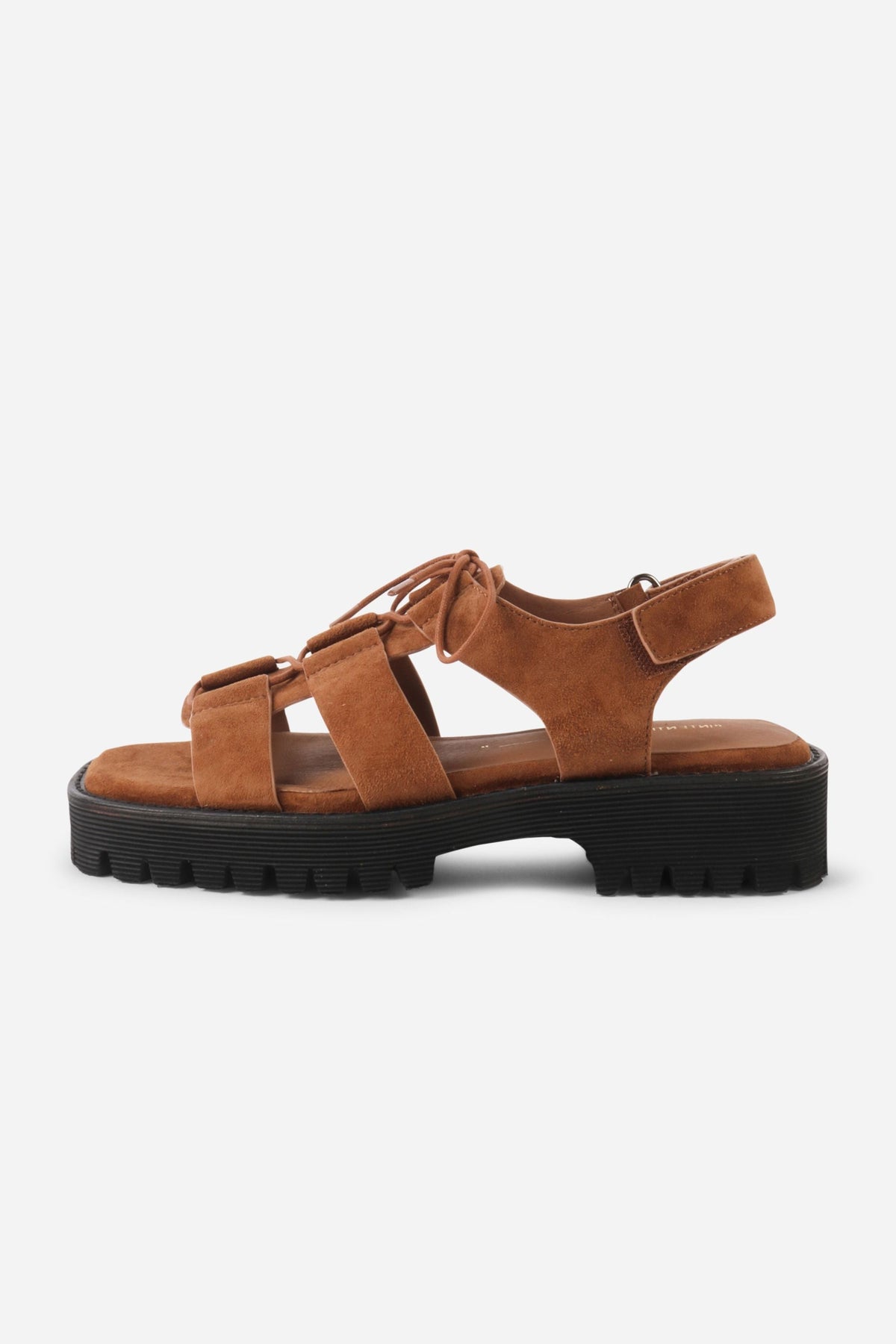 INTENTIONALLY __________. Hampton Sandals