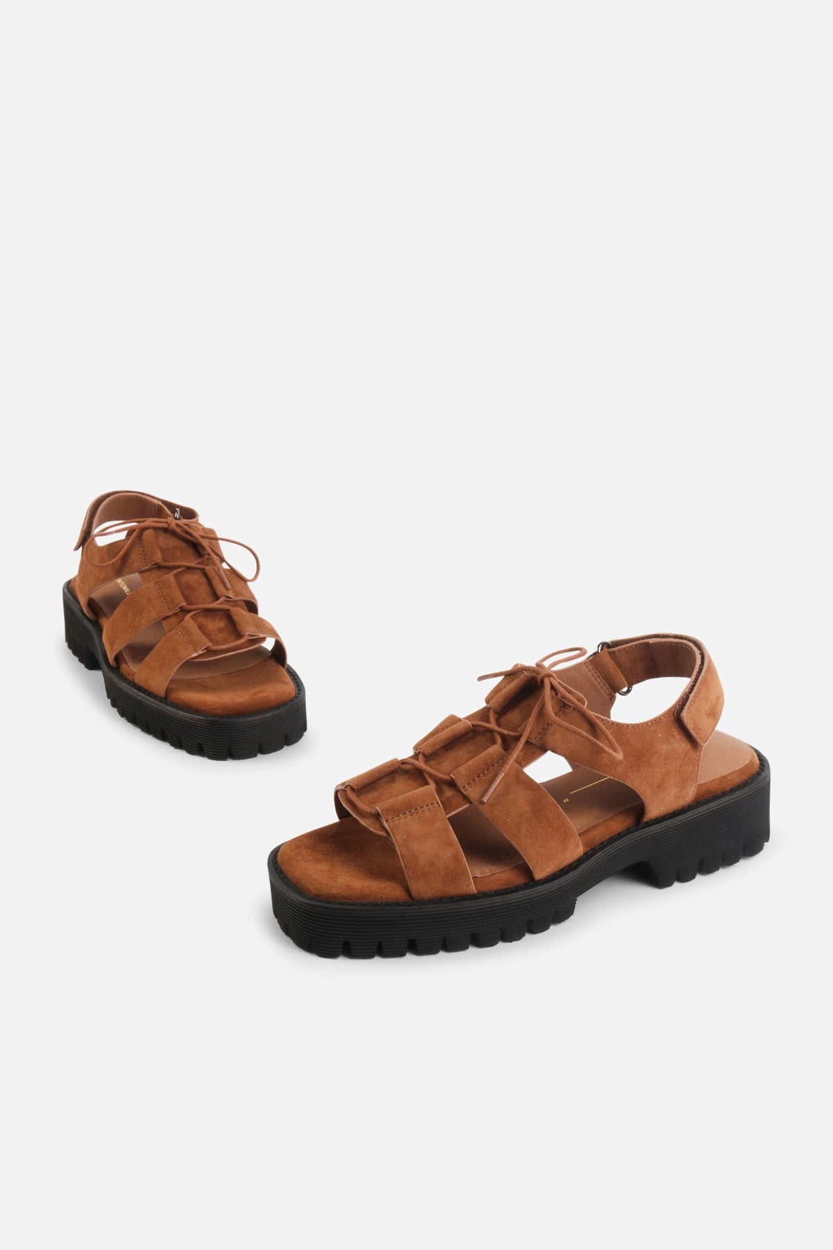 INTENTIONALLY __________. Hampton Sandals