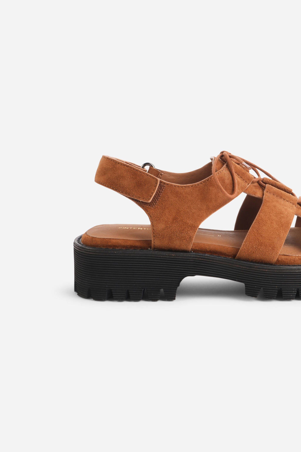 INTENTIONALLY __________. Hampton Sandals
