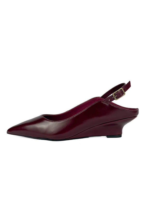 "INTENTIONALLY __________." Lift Micro Wedge Slingback Heel