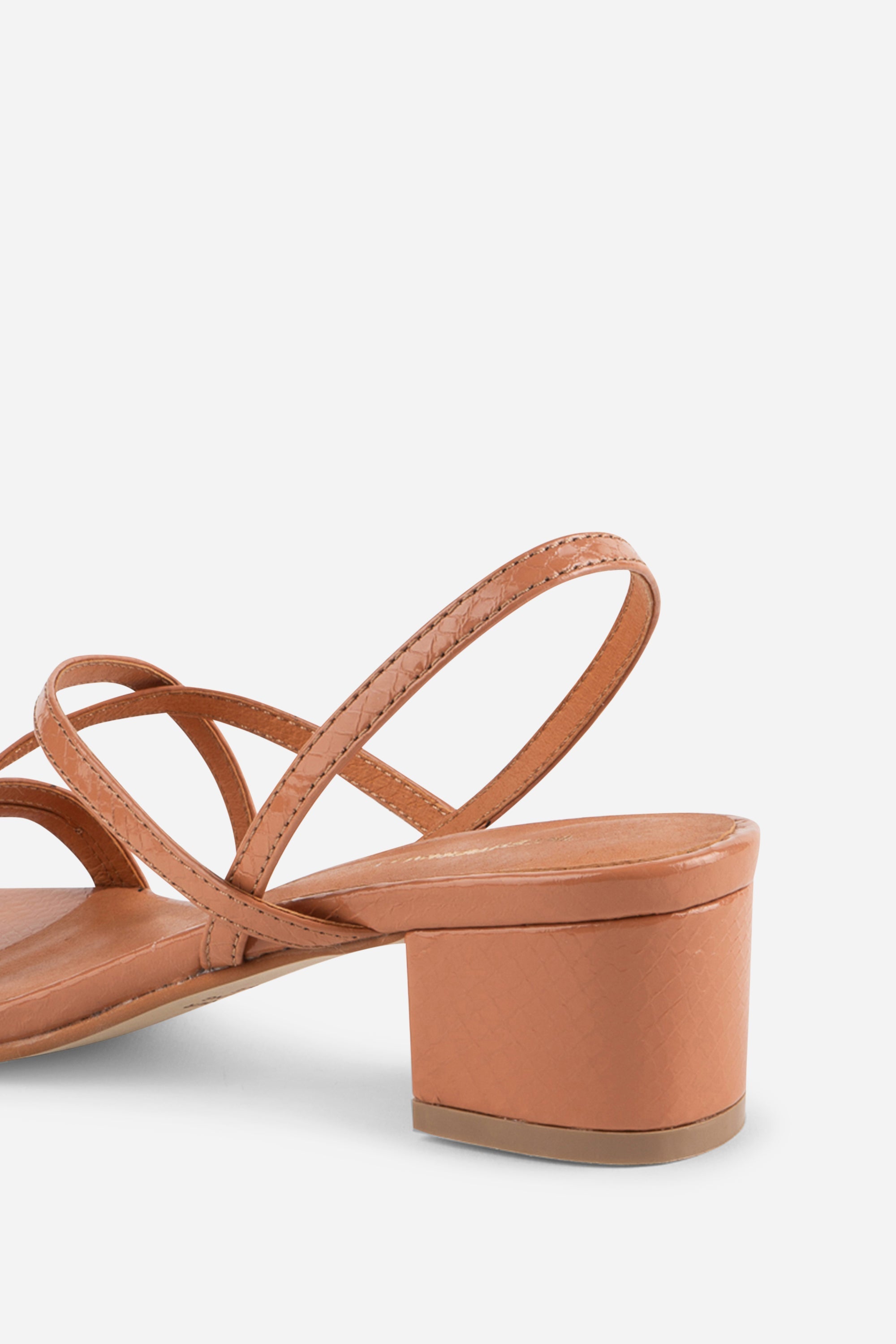 INTENTIONALLY __________. Kariton Block Heel Sandal