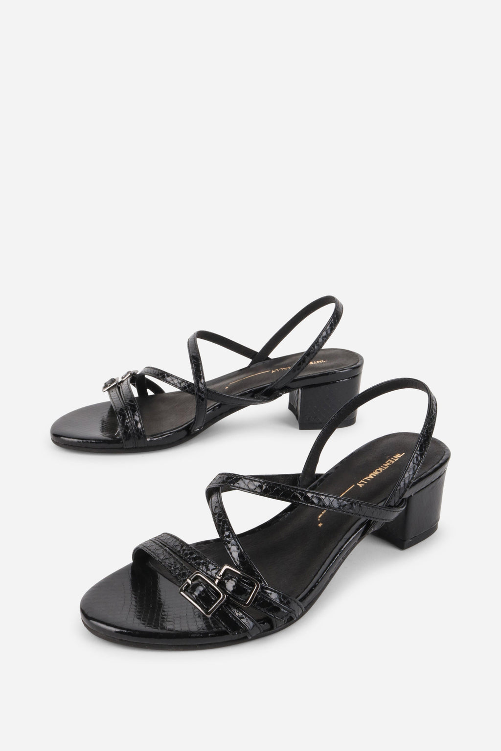 INTENTIONALLY __________. Kariton Block Heel Sandal