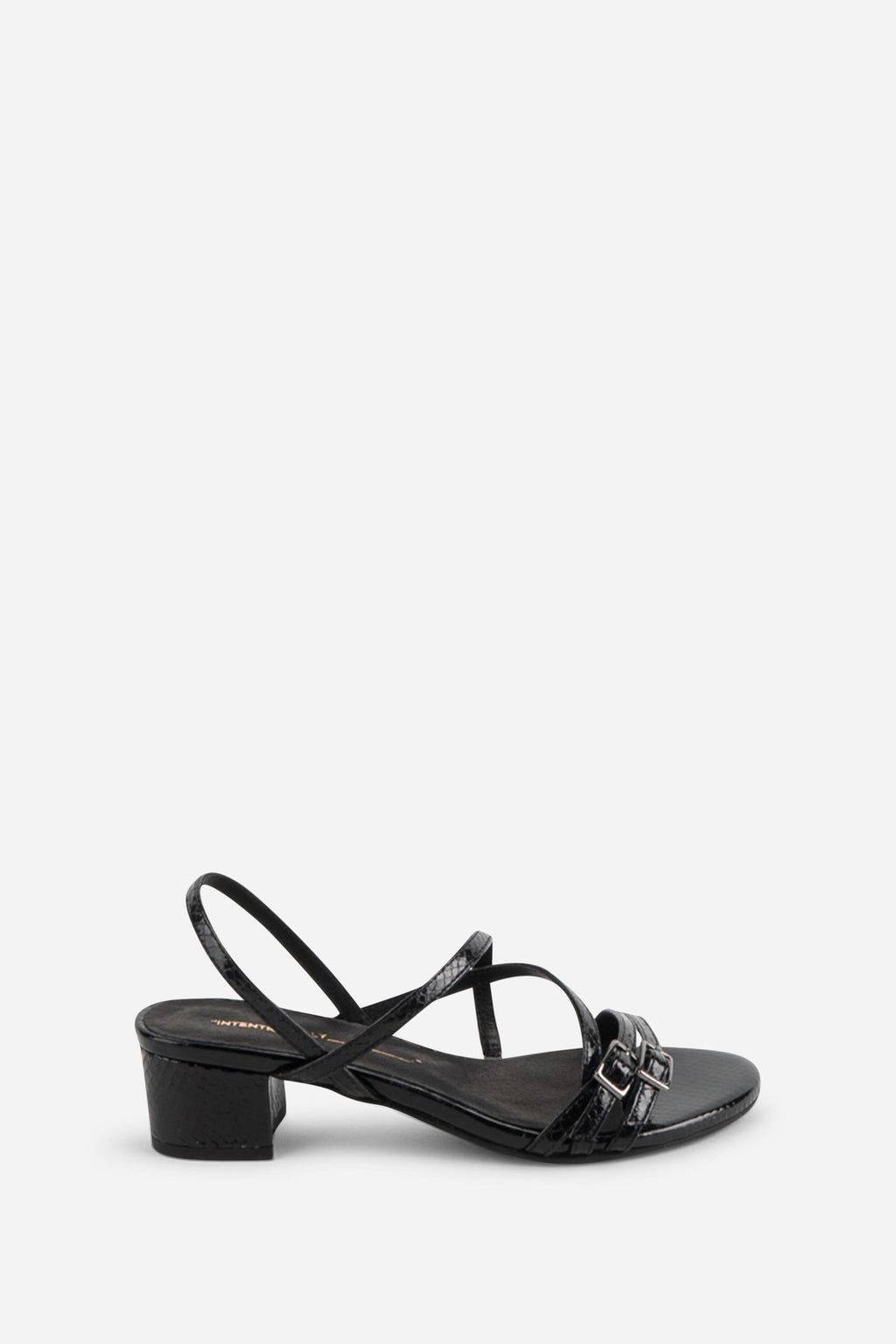 INTENTIONALLY __________. Kariton Block Heel Sandal