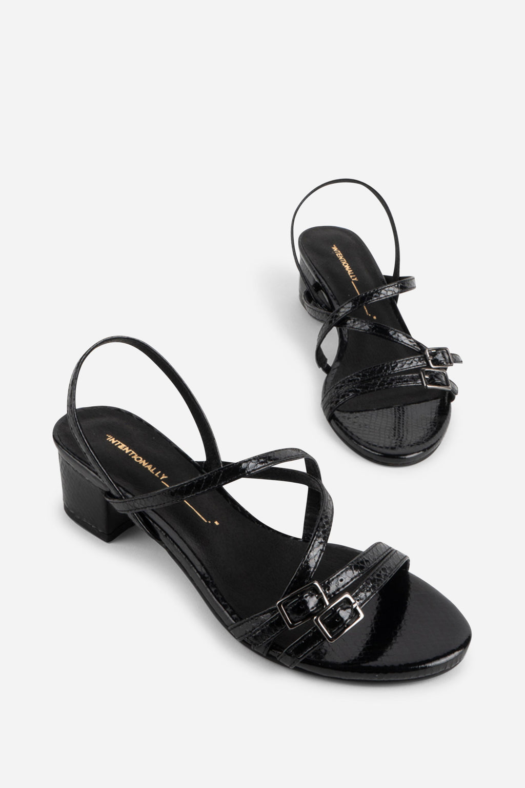 INTENTIONALLY __________. Kariton Block Heel Sandal