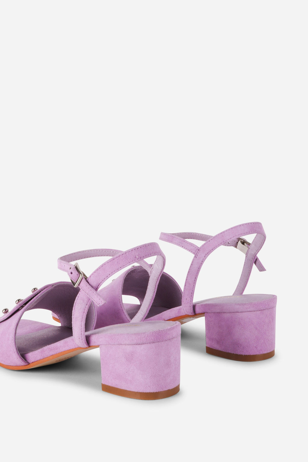 INTENTIONALLY __________. Karizma Block Heel Sandal
