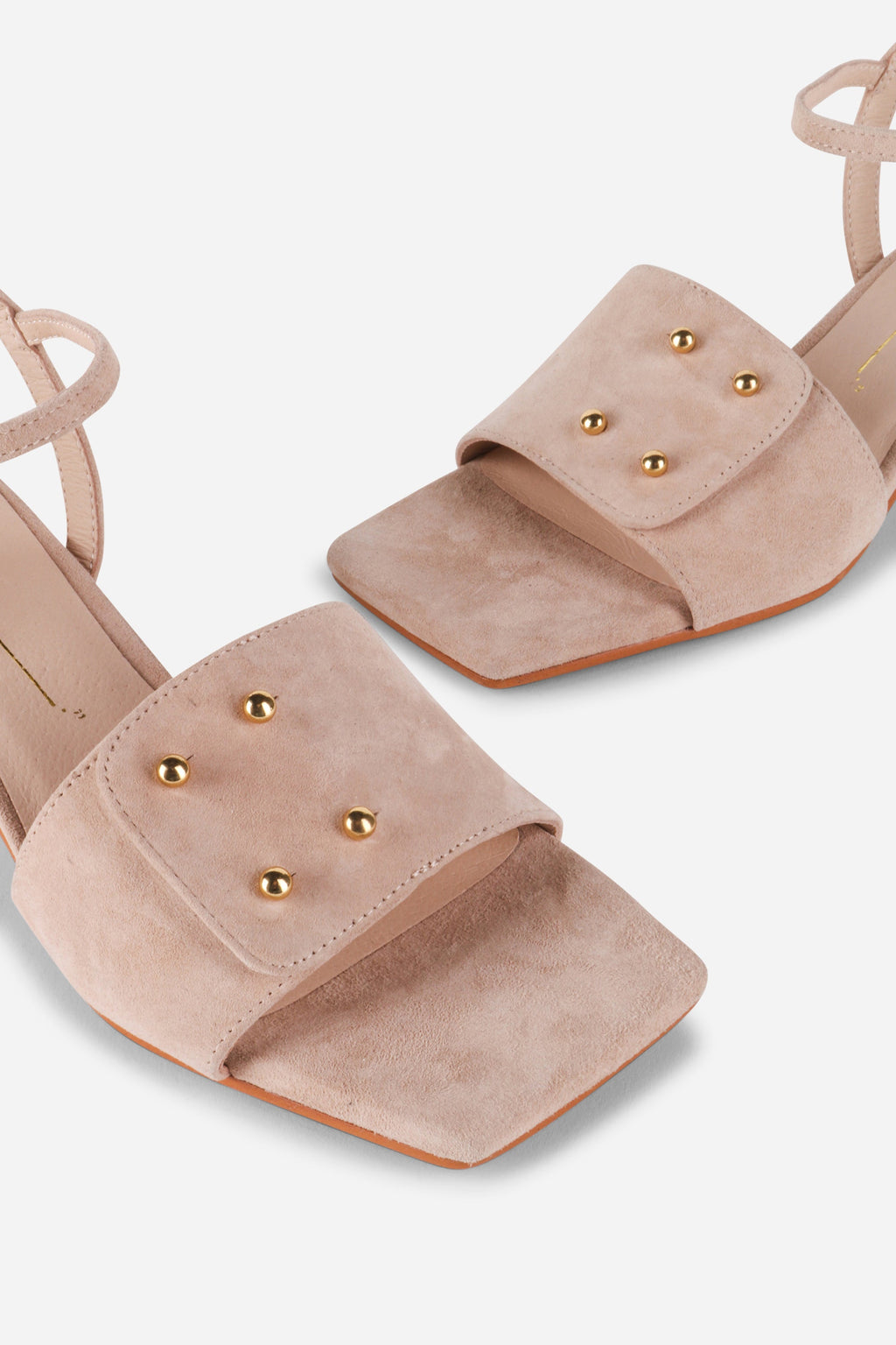 INTENTIONALLY __________. Karizma Block Heel Sandal