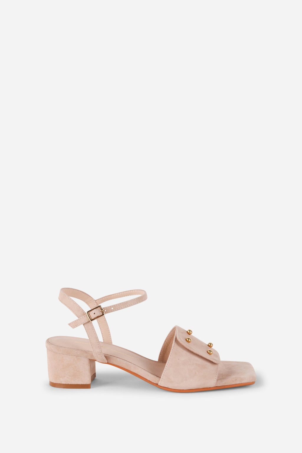 INTENTIONALLY __________. Karizma Block Heel Sandal