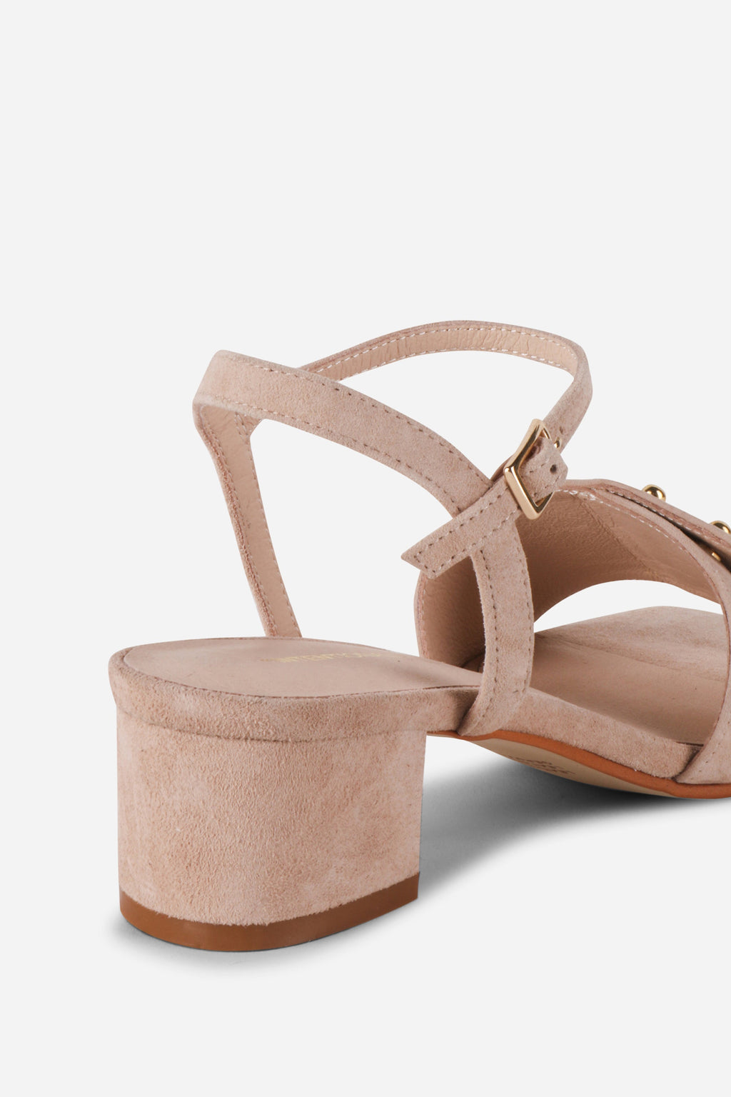INTENTIONALLY __________. Karizma Block Heel Sandal