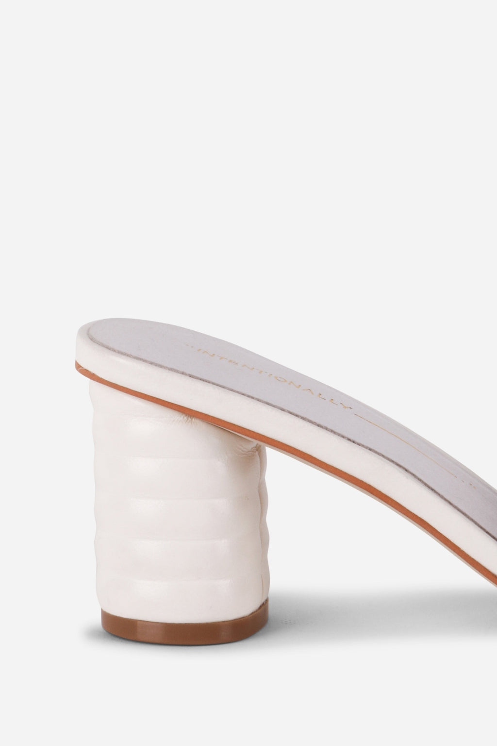 INTENTIONALLY __________. Kizmit Mule Heels