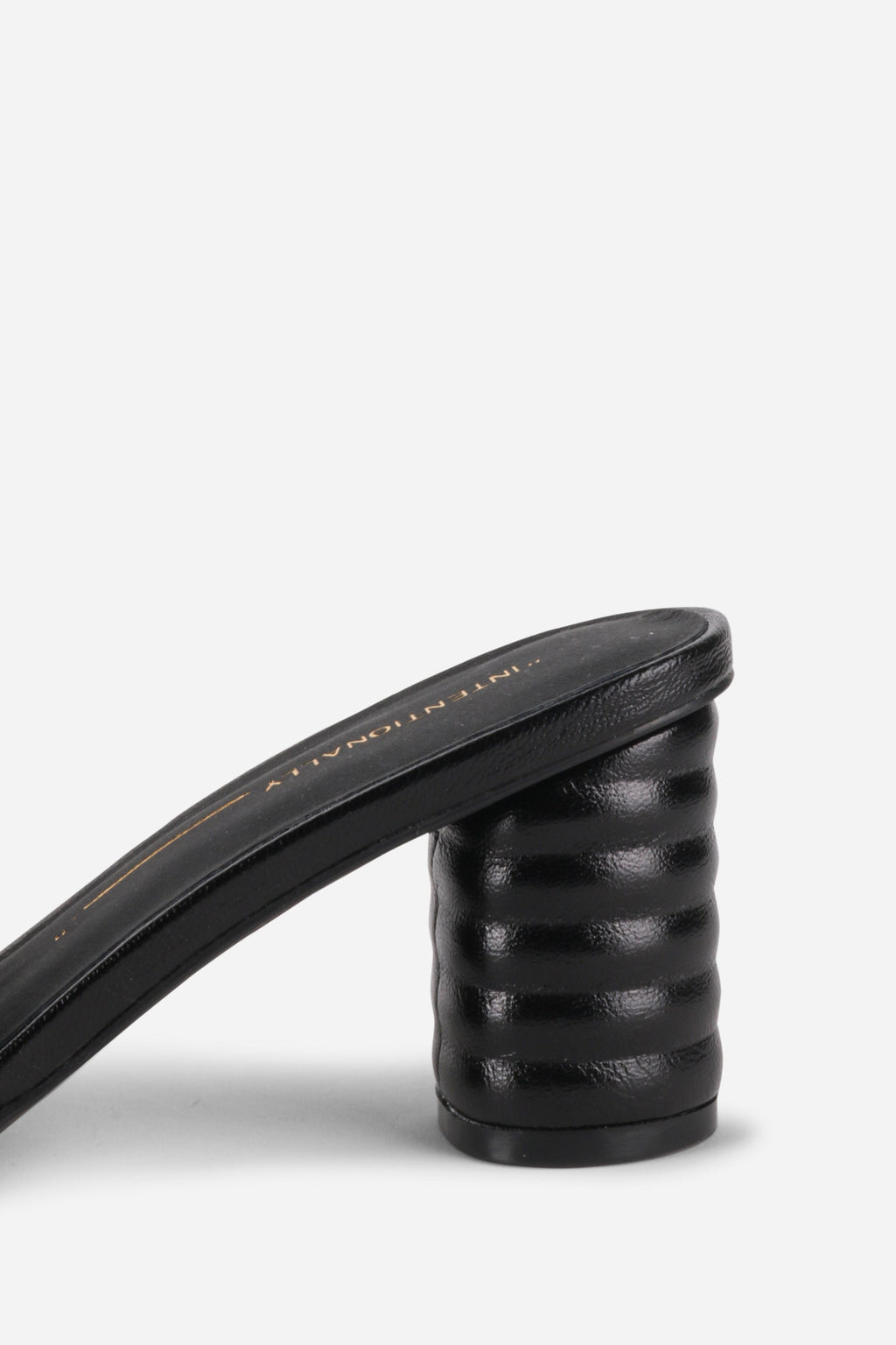 INTENTIONALLY __________. Kizmit Mule Heels