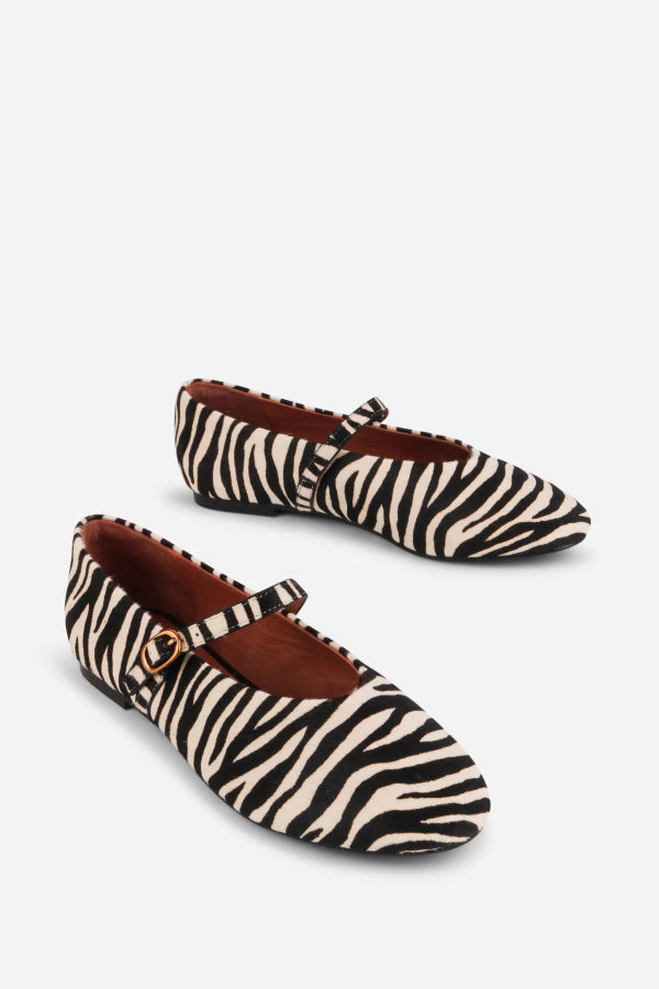 "INTENTIONALLY __________." Larisa Calf Hair Mary Jane Flat