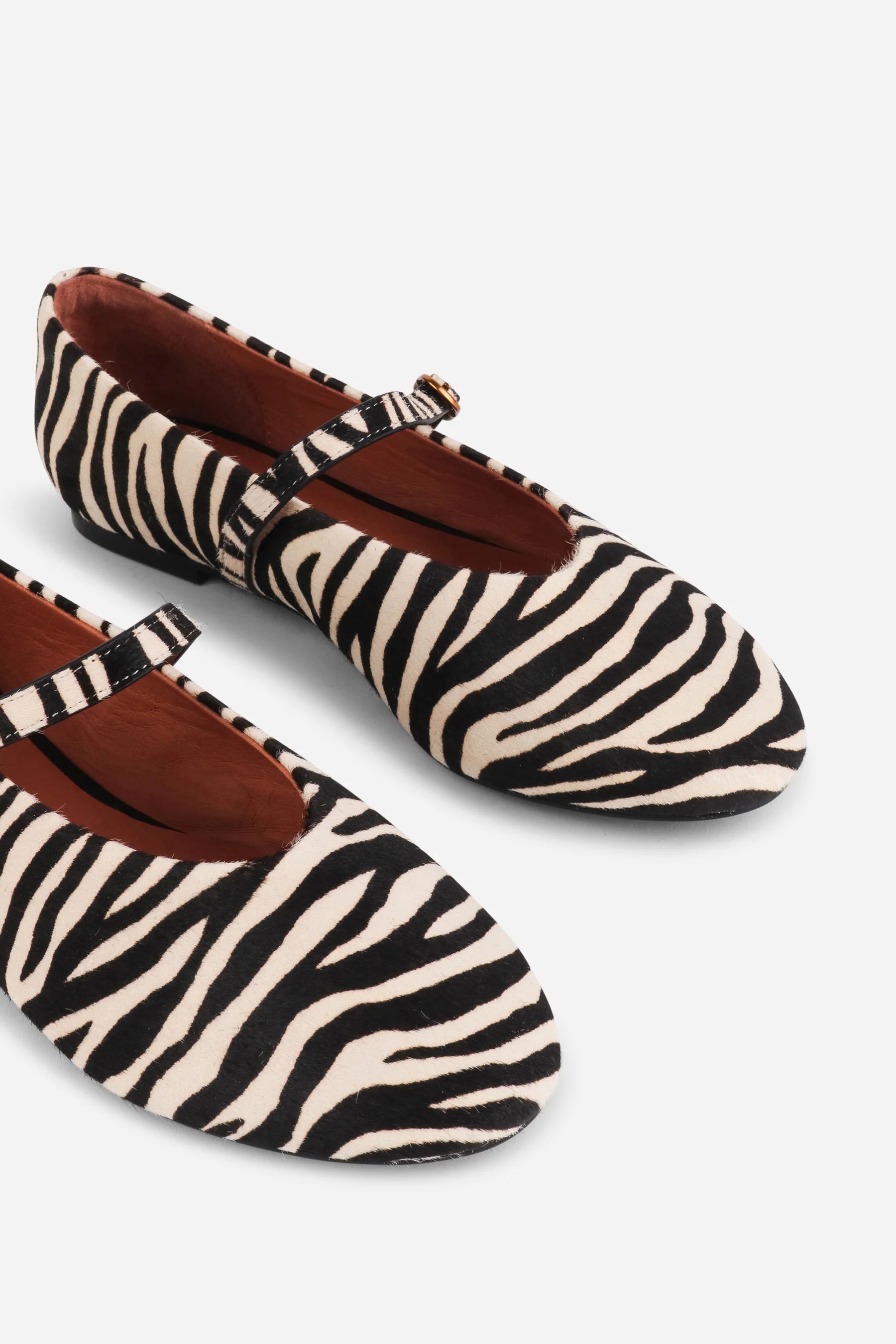 "INTENTIONALLY __________." Larisa Calf Hair Mary Jane Flat