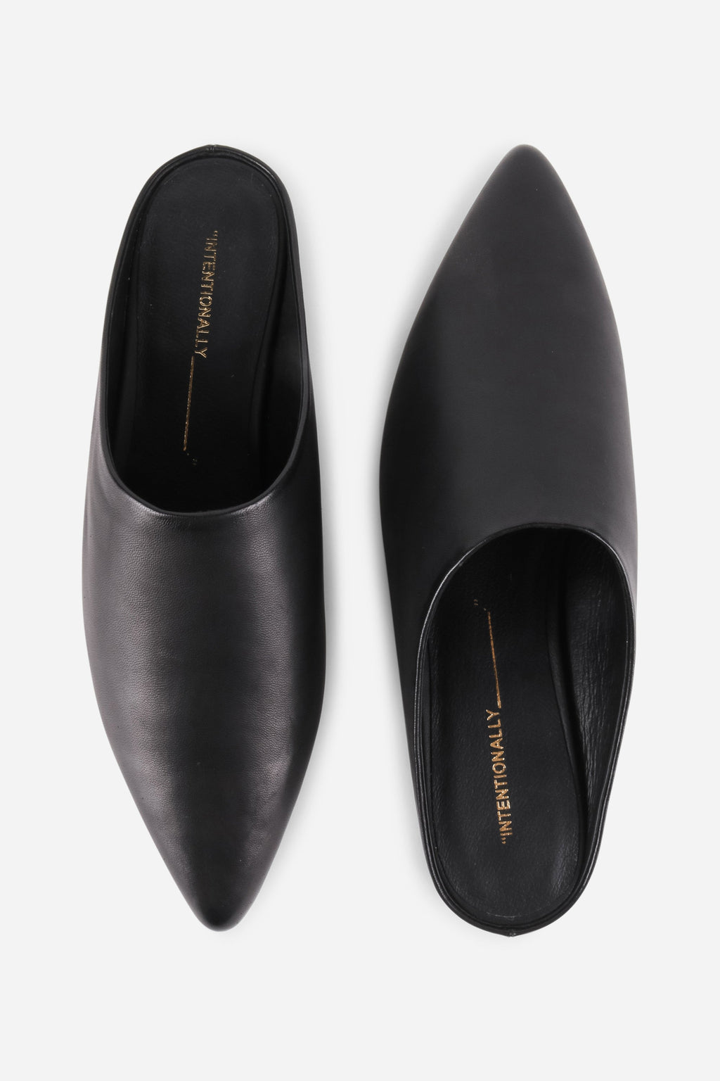 INTENTIONALLY __________. Major Leather Flat Mule - Black