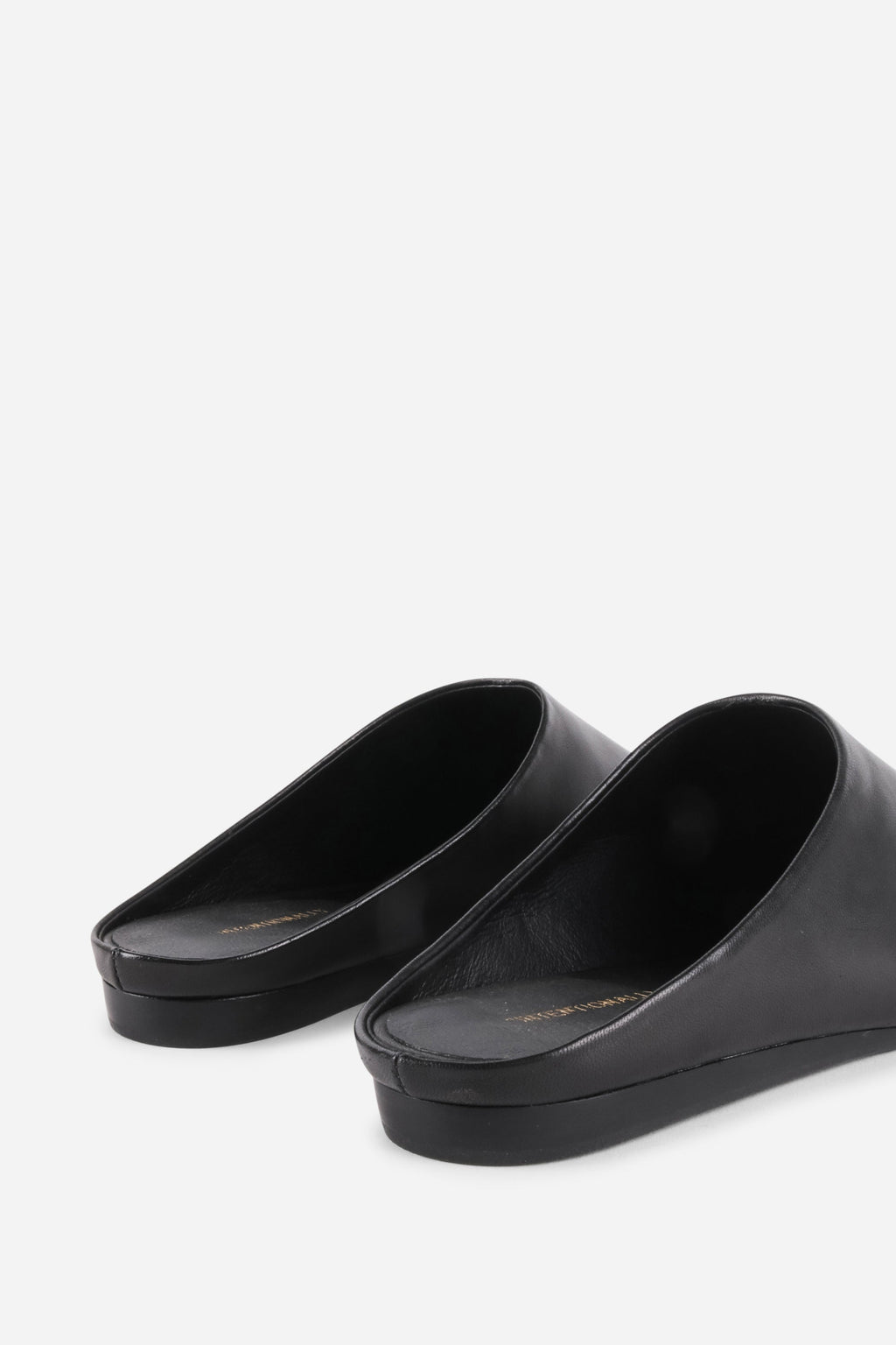 INTENTIONALLY __________. Major Leather Flat Mule - Black