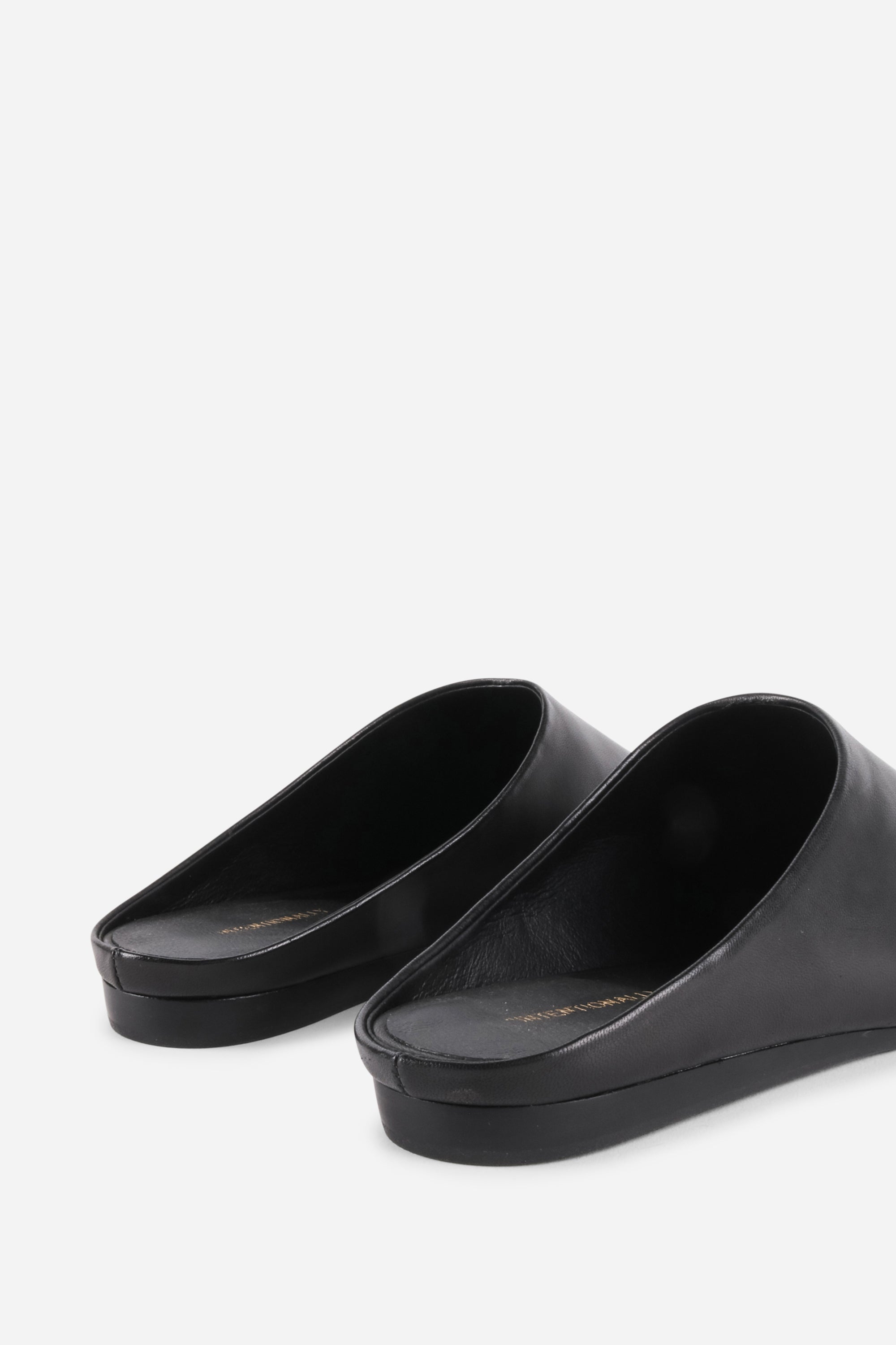 INTENTIONALLY __________. Major Leather Flat Mule - Black