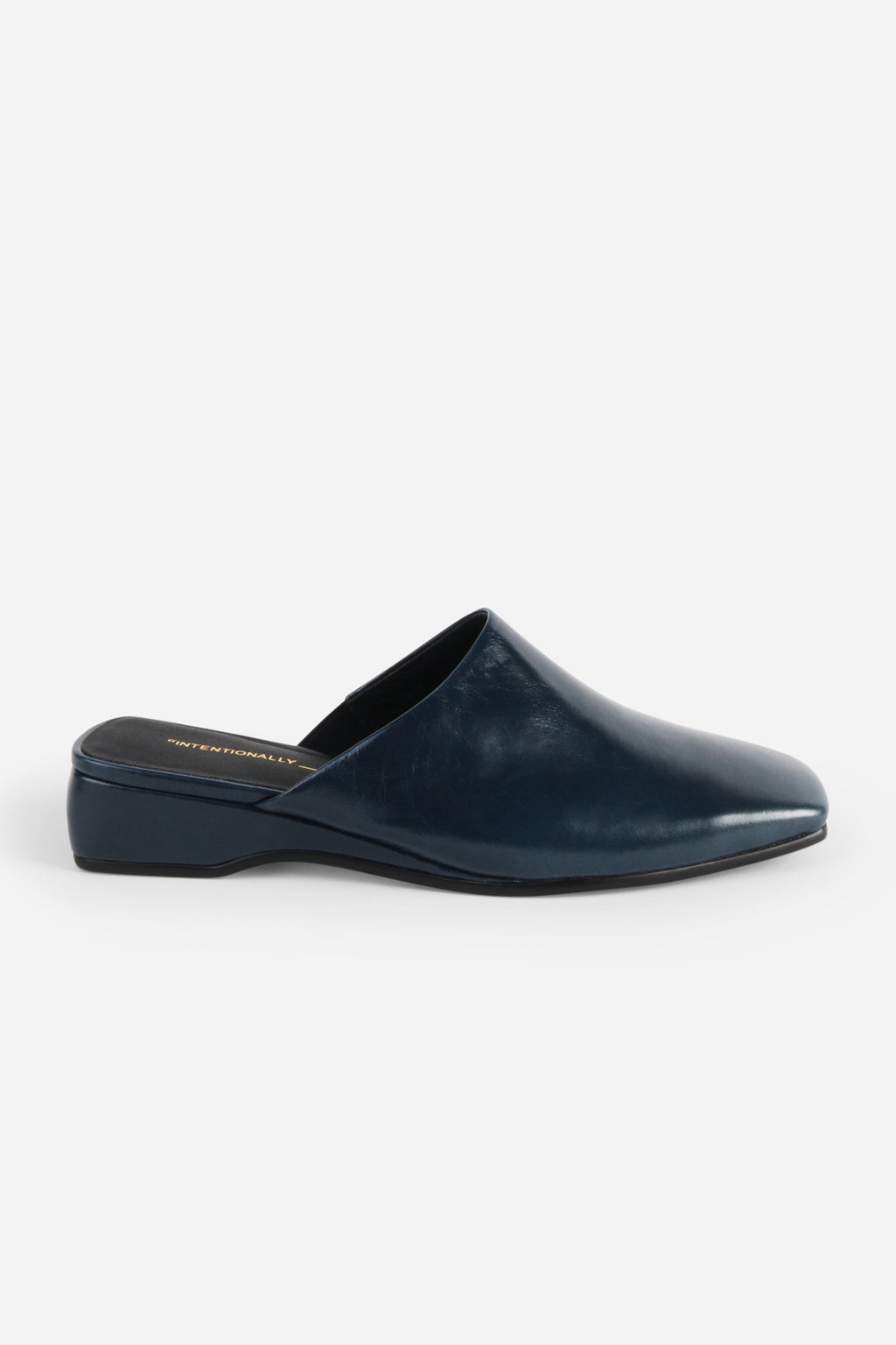 INTENTIONALLY __________. Marer Micro Wedge Heel Mule