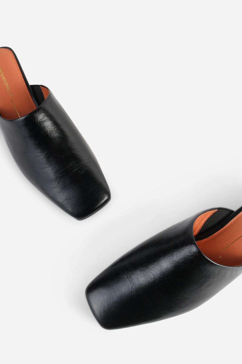 INTENTIONALLY __________. Marer Micro Wedge Heel Mule