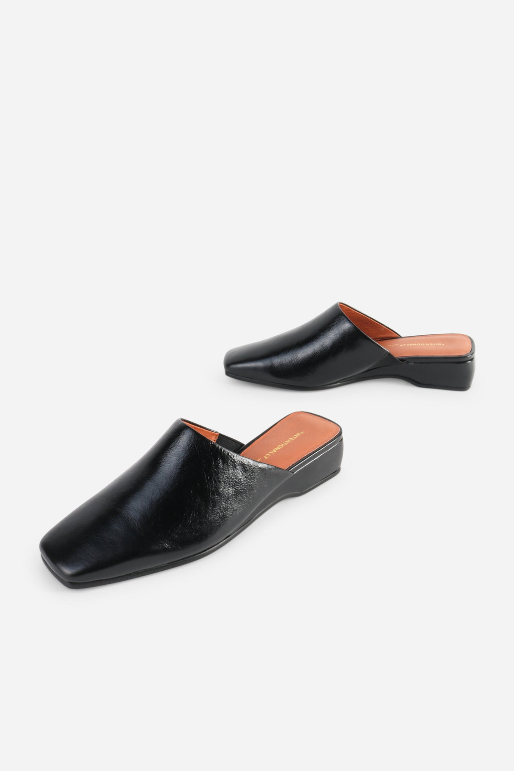 INTENTIONALLY __________. Marer Micro Wedge Heel Mule