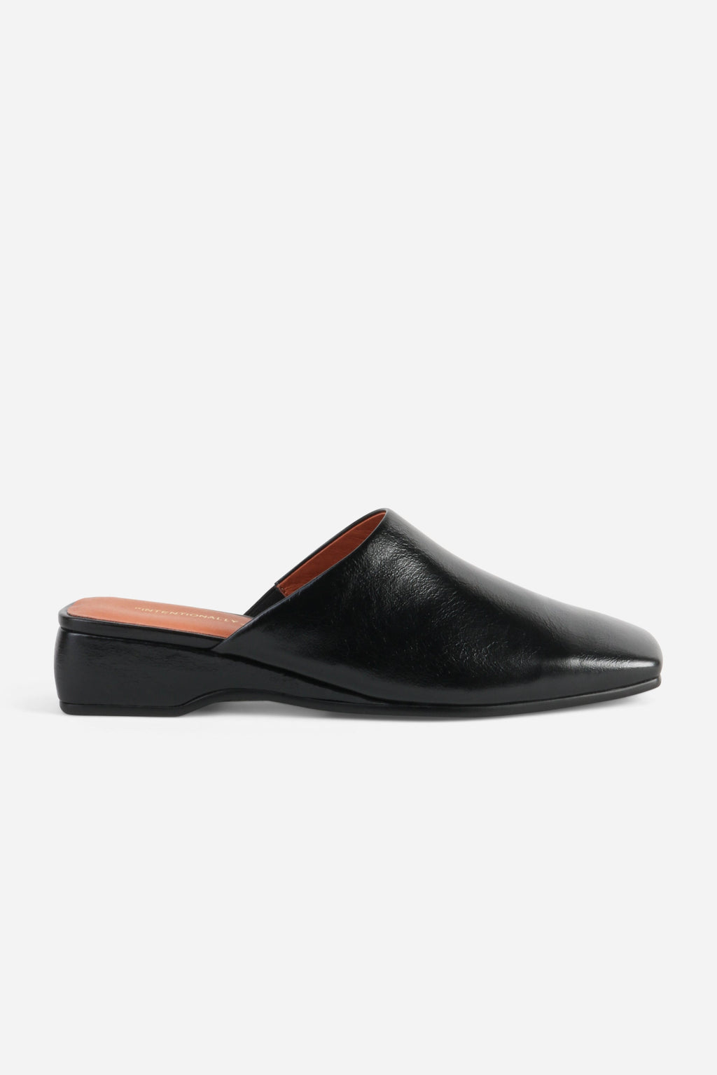 INTENTIONALLY __________. Marer Micro Wedge Heel Mule