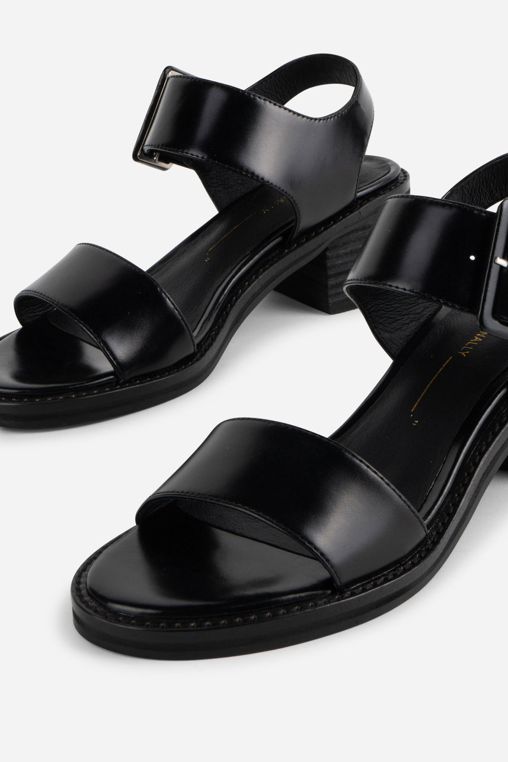 "INTENTIONALLY __________." Mazzy Stacked Heel City Sandal