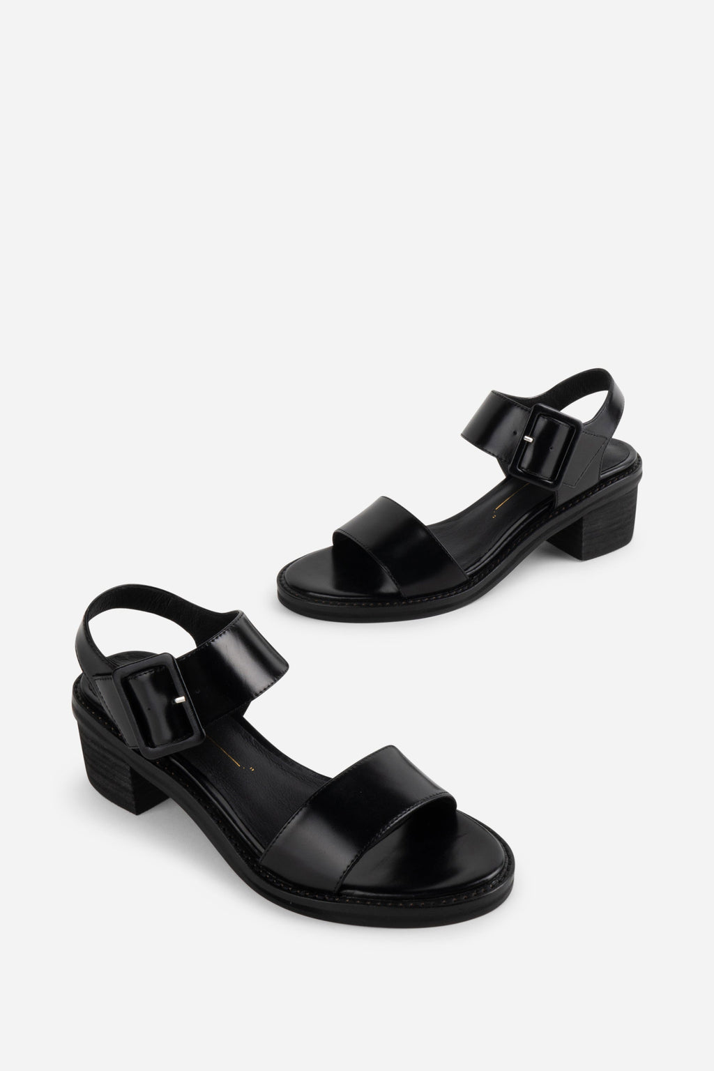 "INTENTIONALLY __________." Mazzy Stacked Heel City Sandal