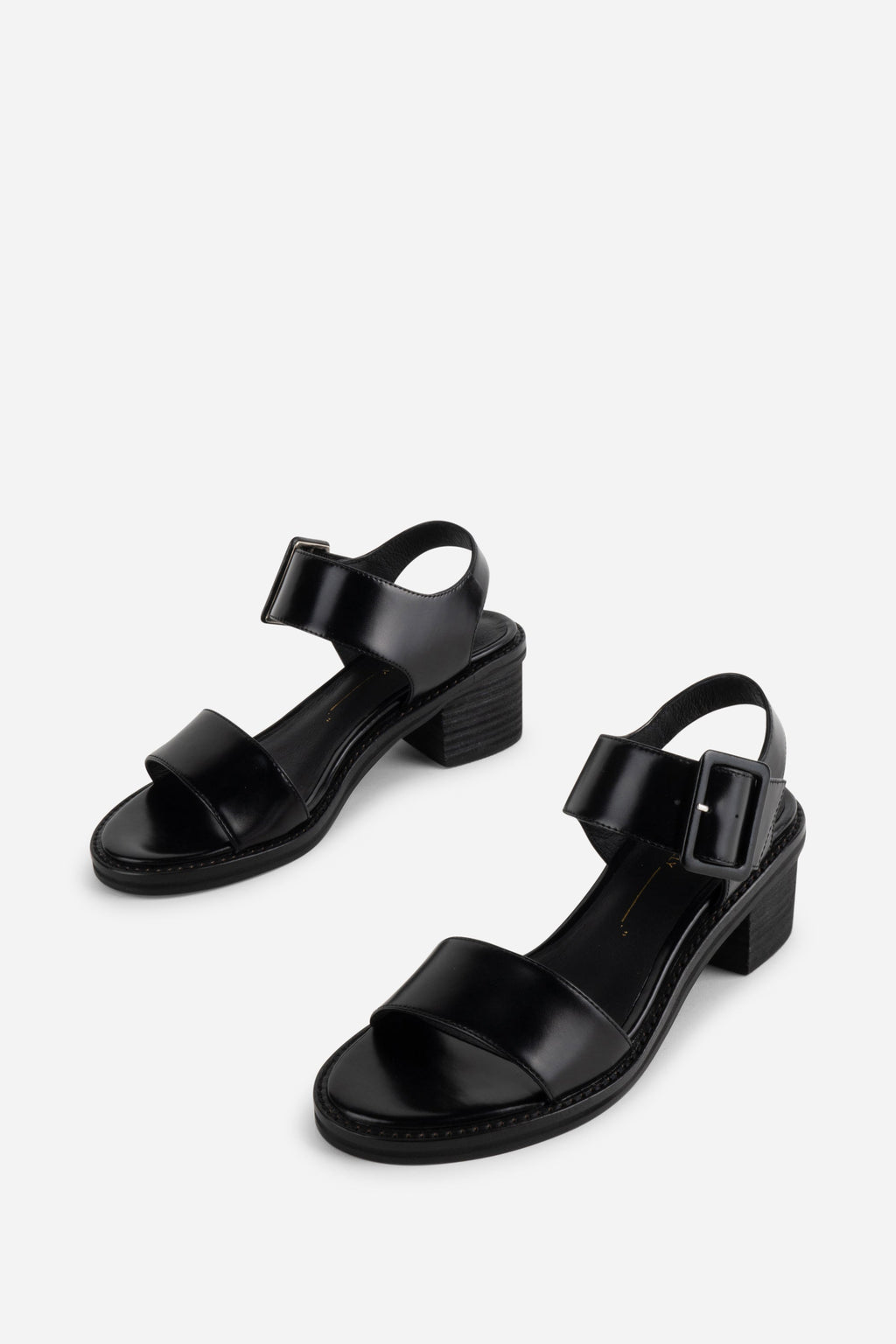 "INTENTIONALLY __________." Mazzy Stacked Heel City Sandal