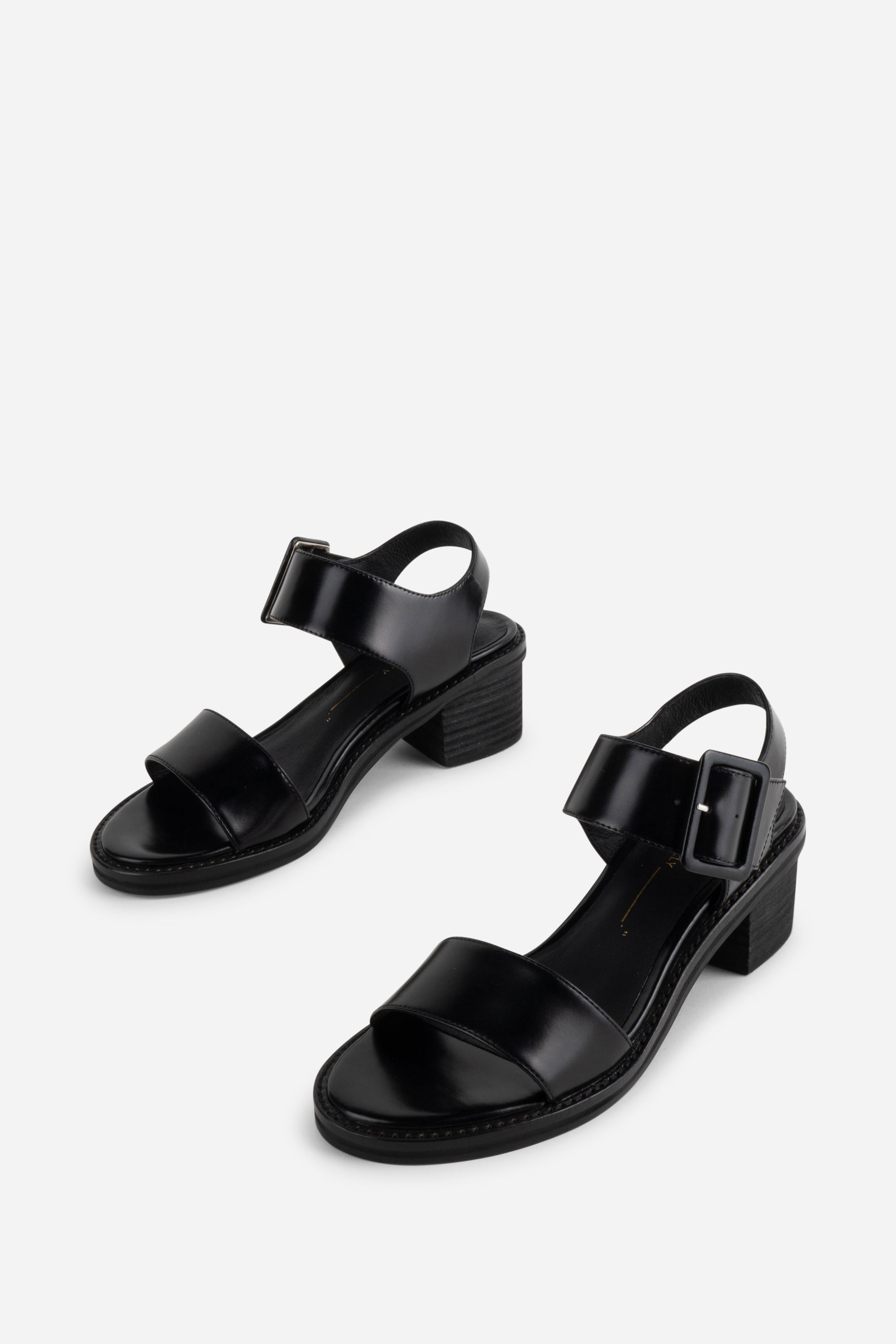 "INTENTIONALLY __________." Mazzy Stacked Heel City Sandal