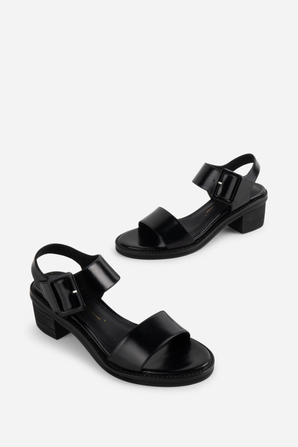 "INTENTIONALLY __________." Mazzy Stacked Heel City Sandal
