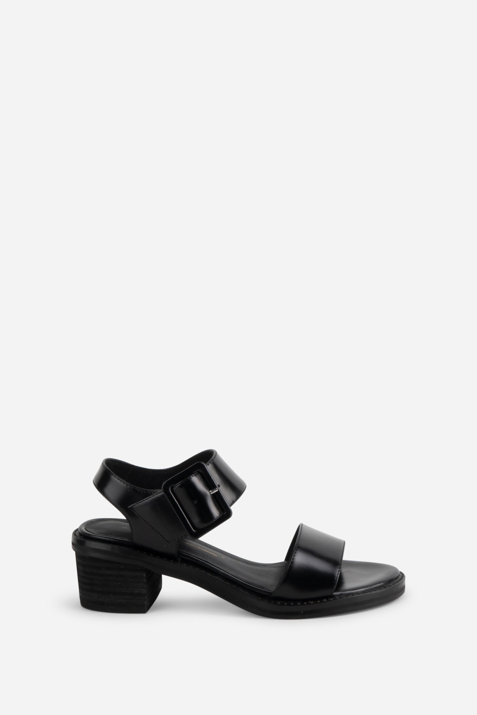 "INTENTIONALLY __________." Mazzy Stacked Heel City Sandal