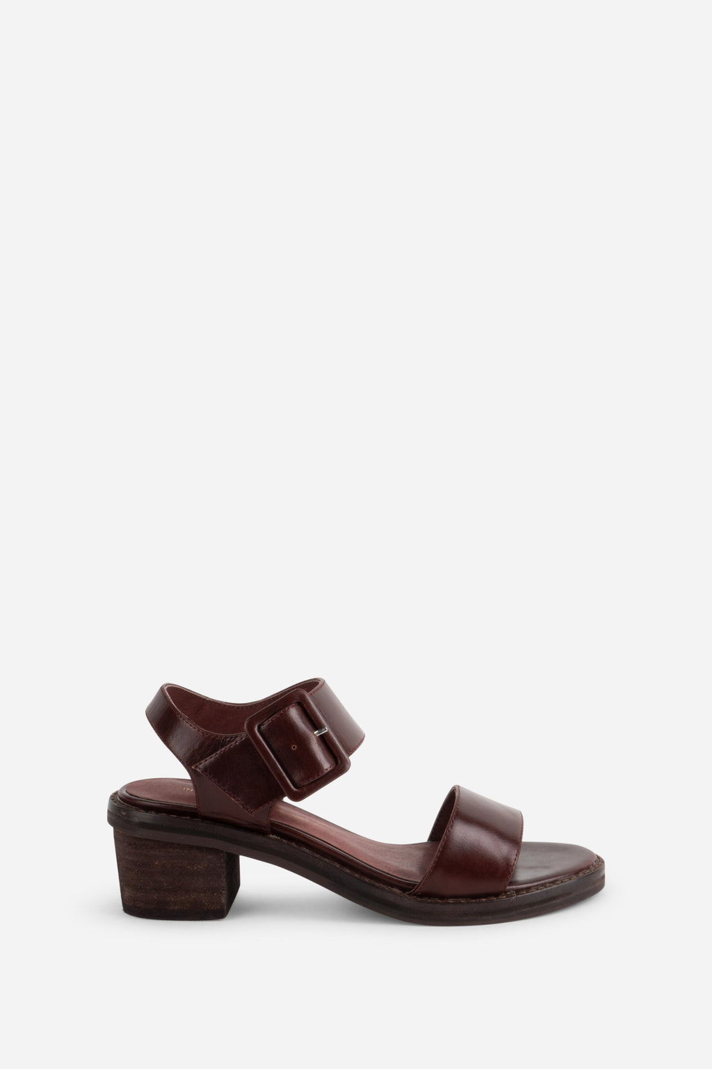 "INTENTIONALLY __________." Mazzy Stacked Heel City Sandal