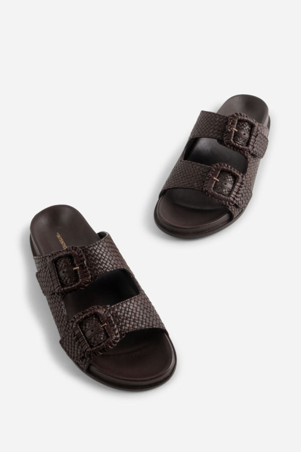 "INTENTIONALLY __________." Milano Sandal
