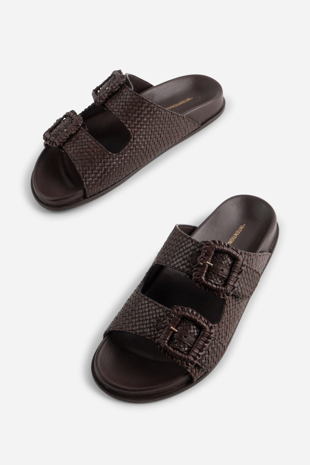 "INTENTIONALLY __________." Milano Sandal
